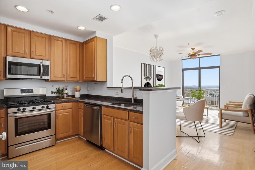 Welcome to #PH02 at The Residence at Station Square in the heart of Clarendon. This top-floor 1-bedroom penthouse sits on the 10th level with a private balcony and open views of the DC skyline.
Freshly painted with high ceilings and an open layout, the living and dining space flows easily into a kitchen with granite countertops and stainless steel appliances. The bedroom is spacious with ample closet space and ensuite access to the bathroom. The unit conveys with an underground garage parking space and separate storage.

The Residences at Station Square is professionally managed with secure entry, an outdoor pool, resident lounge with a game area, and on-site management.

All of Clarendon is right outside your door. The Metro (Orange/Silver lines) is less than 2 blocks away.  And you are steps away from Trader Joe’s, Whole Foods, parks, fitness studios, restaurants, and nightlife, plus easy access to Route 50 and I-66.