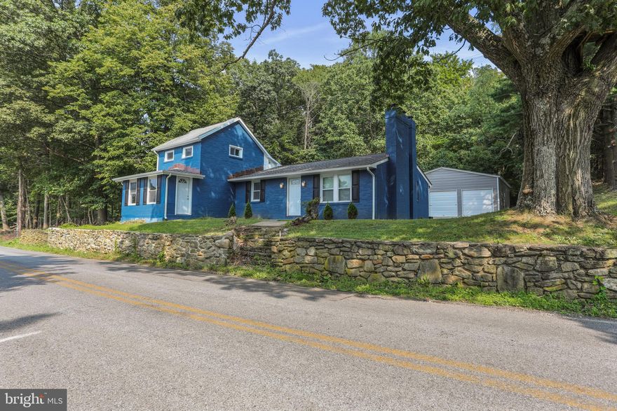 Beautifully renovated 3 bedroom, 3 full bath home on 1 acre across from the Fort Ritchie community. The main level offers 2 bedrooms, 2 full baths, a spacious living room and dining area, a laundry area, and an updated kitchen featuring quartz countertops, a large island, and stainless steel appliances. A bright front enclosed porch and a back deck provide great spaces to relax or entertain while enjoying the peaceful setting and beautiful views. The upper level includes a private bedroom and full bath, while the partially finished basement offers additional living space or storage. Two fireplaces add charm, and a newer HVAC system provides comfort and efficiency.

One of the highlights of this property is the brand new, oversized 3-car detached garage with electric, perfect for vehicles, storage, or a workshop. 

This home is a must-see with its modern updates and functional layout in a convenient Cascade location.