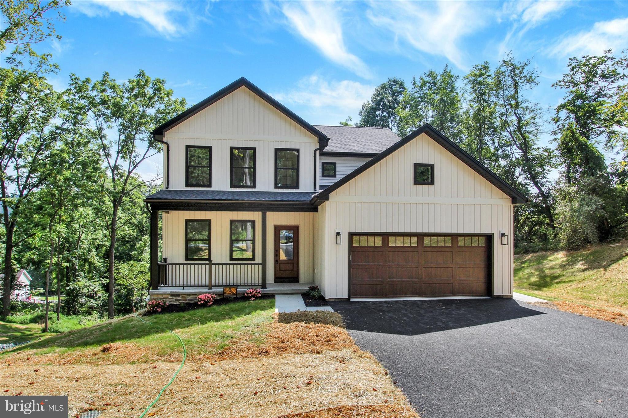 NEWLY BUILT! This beautiful home is located at the end of Possum Trail with almost a one acre partially wooded lot that will make you feel like you are at your own private park. Home features an in home office, covered back deck with a view of the mountain, black stainless kitchen appliances, large island, large walk-in kitchen pantry, 9 ft ceilings on 1st floor, cathedral ceilings in master bedroom, master bathroom with soaking tub and tile shower, all bedrooms have large walk-in closets, luxury vinyl plank throughout entire home. Home is constructed with 2x6 exterior walls. Walk out basement also has 9 ft ceilings. Two zone heating/AC, separate thermostat and zones on main and second level. Exterior outlet for generator use if you would happen to lose power due to an outage, comes with the power cord all you need is a generator! According to Carroll Valley Borough, Possum Trail will be improved with hard surface sometime next year. Currently there is a hard packed stone base on Possum Trail for easy access. Taxes listed are for LAND ONLY. Please do not drive on new blacktop driveway.