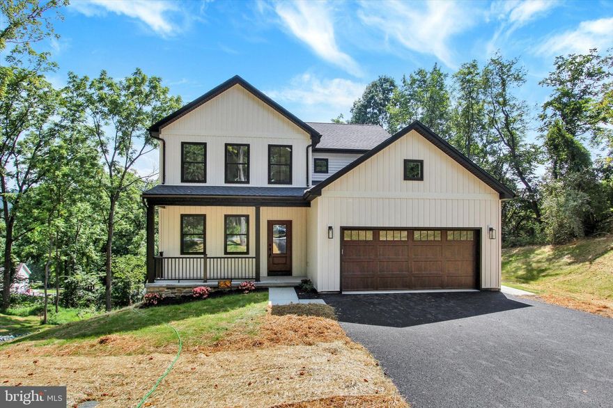 NEWLY BUILT!  This beautiful home is located at the end of Possum Trail with almost a one acre partially wooded lot that will make you feel like you are at your own private park.  Home features an in home office, covered back deck with a view of the mountain, black stainless kitchen appliances, large island, large walk-in kitchen pantry, 9 ft ceilings on 1st floor, cathedral ceilings in master bedroom, master bathroom with soaking tub and tile shower, all bedrooms have large walk-in closets, luxury vinyl plank throughout entire home.  All closets and pantry have solid painted shelving, no wire shelving here! Walk out basement also has 9 ft ceilings. Two zone heating/AC, separate thermostat and zones on main and second level.  Exterior outlet for generator use if you would happen to lose power due to an outage, comes with the power cord all you need is a generator! Taxes listed are for LAND ONLY.