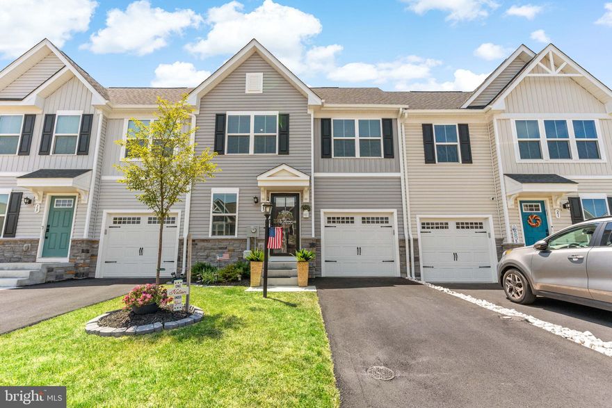 Welcome to this beautifully designed one-year-old villa which offers both convenience and comfort, making it a standout choice for any discerning buyer. Located close to shopping and major commuter routes, this property ensures easy access to everyday essentials and effortless commuting. The neighborhood is enhanced with walking paths, a picnic area, and common grounds, providing ample opportunities for outdoor recreation and community engagement.

The villa itself boasts a thoughtful layout with a main level bedroom, catering to various lifestyle needs with flexibility and convenience in mind. The interior reflects meticulous attention to detail and low-maintenance features, allowing for a blend of style and practicality. The extraordinary kitchen equipped with a large island, granite countertops and attractive stainless steel appliances will make meal prep a breeze, while allowing for everyone to be part of the conversation due to its open design concept.

Step outside onto the covered rear deck and envision relaxing evenings or entertaining guests in this inviting outdoor space. Whether enjoying the tranquility of the neighborhood or hosting gatherings, the deck adds an additional dimension to the home's appeal.

This property is a testament to modern living with its contemporary design and emphasis on functionality. Ideal for those seeking a well-appointed home in a vibrant community setting, this villa is ready to welcome its next fortunate owner. Don't miss out on the opportunity to make this meticulously cared for residence your own.