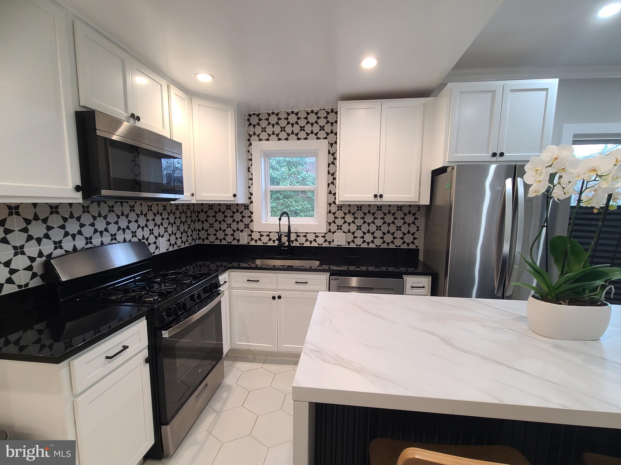 ***Location, Location, Location*** This beautiful open floorplan 4 bedroom 2 baths, perfectly located. It's 2 miles to the beltway. 3 miles to the National Harbor, MGM, Tanger Outlets and rt 295. 6 miles to Old Town Alexandria and Downtown Washington DC. Approximately 1.5 miles to the nearest Subway station.
Total Open floor-plan Renovation completed in 2022 which included a new roof, new HVAC, Stove, microwave, refrigerator, and new washer and dryer. This house also comes with a Home Warranty where you can choose your own licensed contractor!
Located on a quiet street in a friendly neighborhood with tons of privacy, this home is just minutes away from shopping, dining, and entertainment.