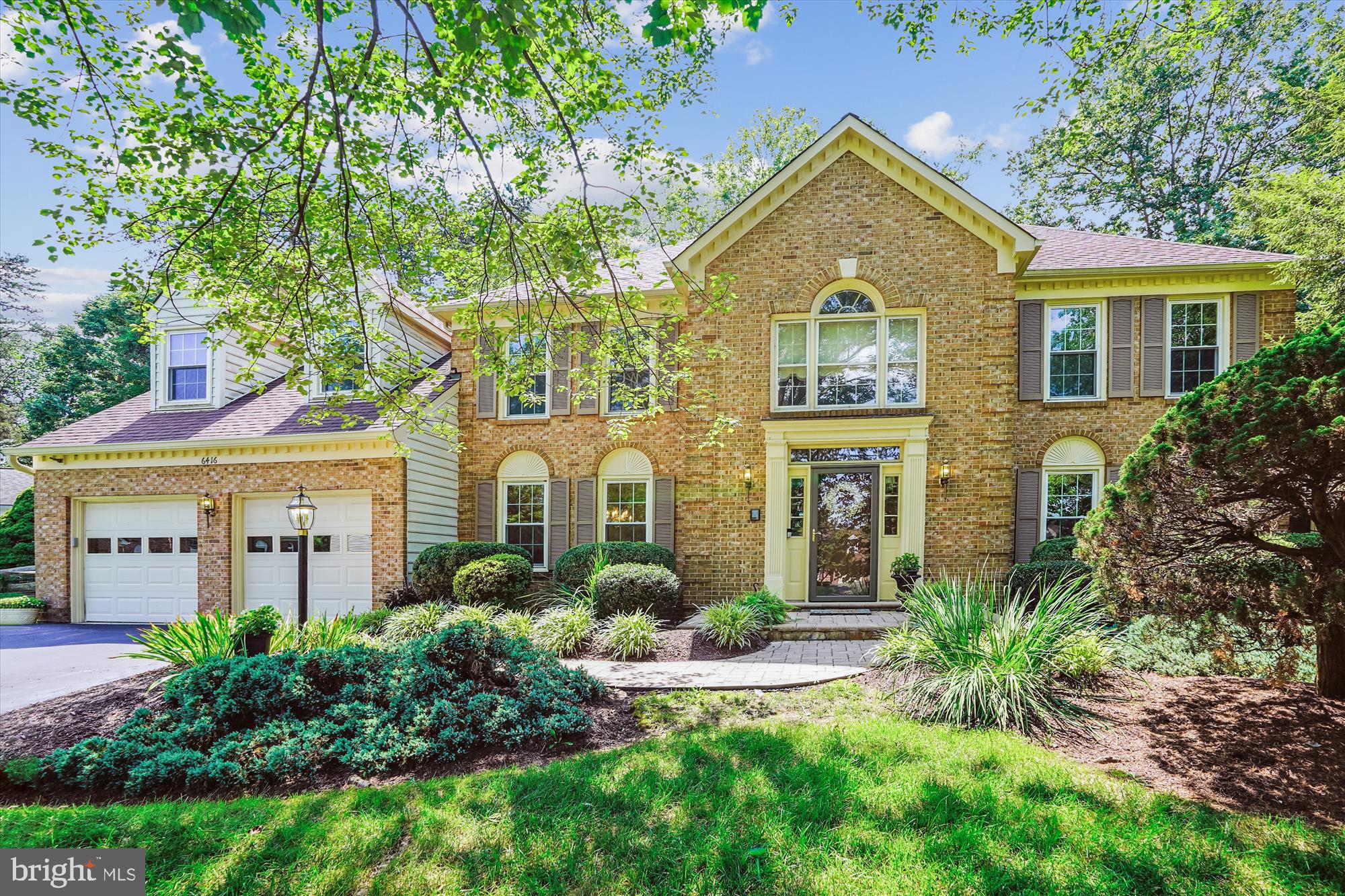 Rarely available Teakwood model in sought-after Virginia Run, this expansive brick-front colonial is brimming with potential and perfectly suited for those seeking space, function, and the chance to make it their own. Ideally situated on nearly 1/3 acre at the end of a deep cul-de-sac, the home features every builder addition offered — both a main level private den, with fireplace, and a separate office—providing flexibility for work, study, or multigenerational living. The impressive two-story foyer welcomes you with marble floors, a sweeping curved staircase, and sightlines into the dramatic two-story great room with fireplace filled with natural light from soaring atrium windows. The spacious kitchen invites entertaining, complete with a custom center island with bar seating, breakfast area, and adjacent butler’s pantry that seamlessly serves the formal dining room. Hardwood floors run throughout majority of the main level that also enjoys high ceilings and enhanced classic architectural trim. Upstairs, the generous primary suite is a true retreat with its own fireplace, a separate sitting room, dual walk-in closets, and a large en-suite bath ready for personalization. Two bedrooms share a well-sized hall bath with double vanities, and one bedroom suite includes its own bath—perfect for guests or an older child. Outdoor living is just as inviting with a full-width deck, built-in seating, and three sets of French doors opening from the great room, den, and office—ideal for gatherings or quiet afternoons surrounded by lush landscaping and shade trees. The walk-up basement is framed out, insulated walls, and features a fireplace and 3-piece rough-in bath plumbing, all offering approximately 1,500 square feet of ready-to-finish space. With a newer roof (2018), windows (2017), HVAC (2017–18), dishwasher (2022), and Refrigerator (2025), many of the major systems have been updated—leaving the interior as a blank canvas for your design vision. This is a rare opportunity to own one of Virginia Run’s most desirable floorplans and make it distinctly yours.