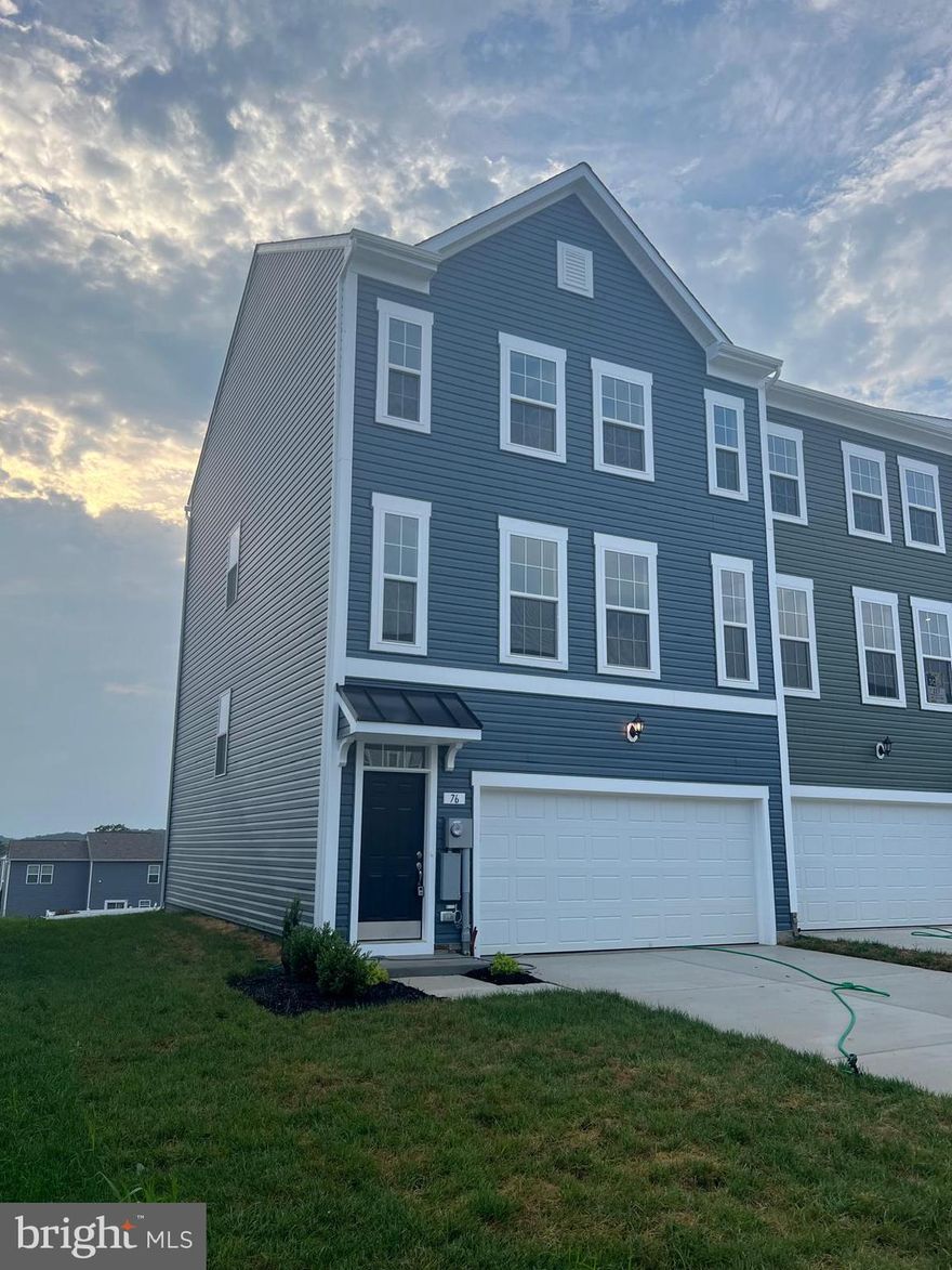 Ready to Move In! Overlook at Riverside - Brand New Townhome - End Unit

This stunning townhome features  End Unit 4 bedrooms and 3.5 baths. Upon entry, you'll find a finished Recroom with a full bathroom adding extra space. The main level boasts luxury vinyl plank flooring throughout, a spacious living room with a powder room, and an eat-in kitchen with an island, granite countertops, stainless steel appliances, and a spacious deck.

The primary suite includes a generous walk-in closet and an en suite bath with a dual sink vanity and an oversized seated shower. The upper level is completed by two secondary bedrooms, a full bath, a linen closet, and a centrally located laundry room.

Additional features include a double car garage, a large driveway that can accommodate four cars, and additional guest parking. The community offers free amenities such as a dog park, children's park, basketball court, tennis court, and recreation area.

Located in a prime spot for I-81, Rt 11, and I-70 commuters, this home offers mountain views, is within walking distance to shopping and restaurants, and provides access to Spring Mills schools. It's also close to the interstate and just minutes from the MD line. This rental won't last long!