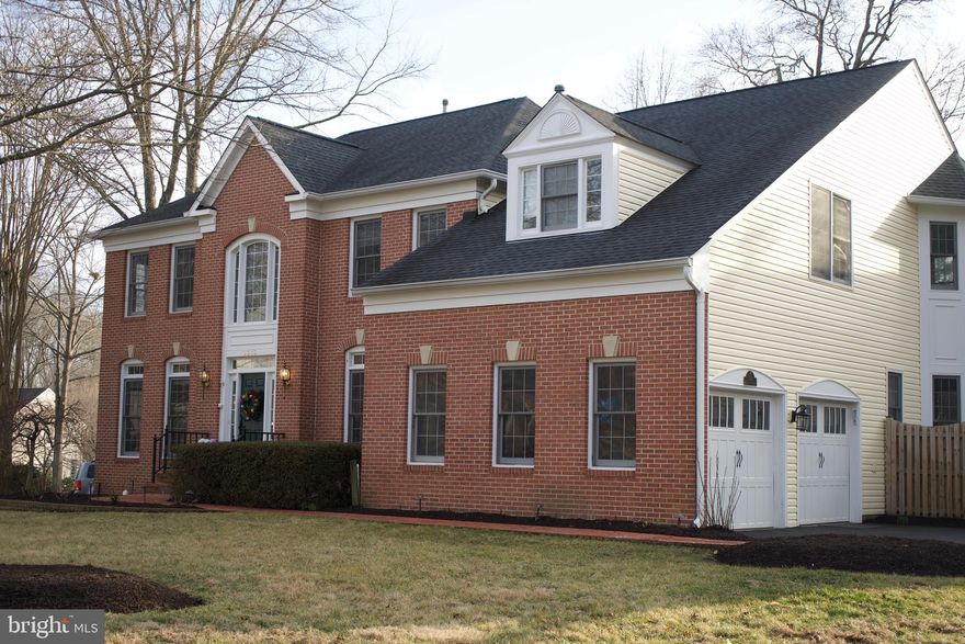 Welcome to this stunning light-filled Colonial on a premier corner lot in the desirable Barrington community of Fairfax Station. One of the largest homes in the neighborhood, this impressive residence offers over 5,600+ sq ft across three finished levels with exceptional upgrades throughout.
The main level features a dramatic two-story family room, formal living and dining rooms, a private office, and a renovated kitchen with granite countertops and stainless steel appliances. Upstairs, the spacious primary suite includes a sitting room and a beautifully upgraded spa-style bath with dual vanities and frameless shower, along with generously sized secondary bedrooms.
The fully finished walk-up basement offers a wet bar, full bath, and flexible den space perfect for guests, a gym, or home office. Enjoy outdoor living on the extended two-level Trex deck with hot tub overlooking a private fenced backyard.
Major updates include:
New roof with 50-year warranty (2017), new siding (2017), Trex deck and basement egress (2019), backyard fence (2020), basement upgrades with wet bar (2023),  Both HVAC systems have been upgraded, with replacements completed in 2023 and 2025, and new water heater (2024). The home also features fresh paint and new carpet throughout.
Barrington residents enjoy community pool and scenic trails connecting to Lake Mercer and Burke Lake.
Exceptional space, extensive upgrades, and a prime Fairfax Station location—this home truly has it all.