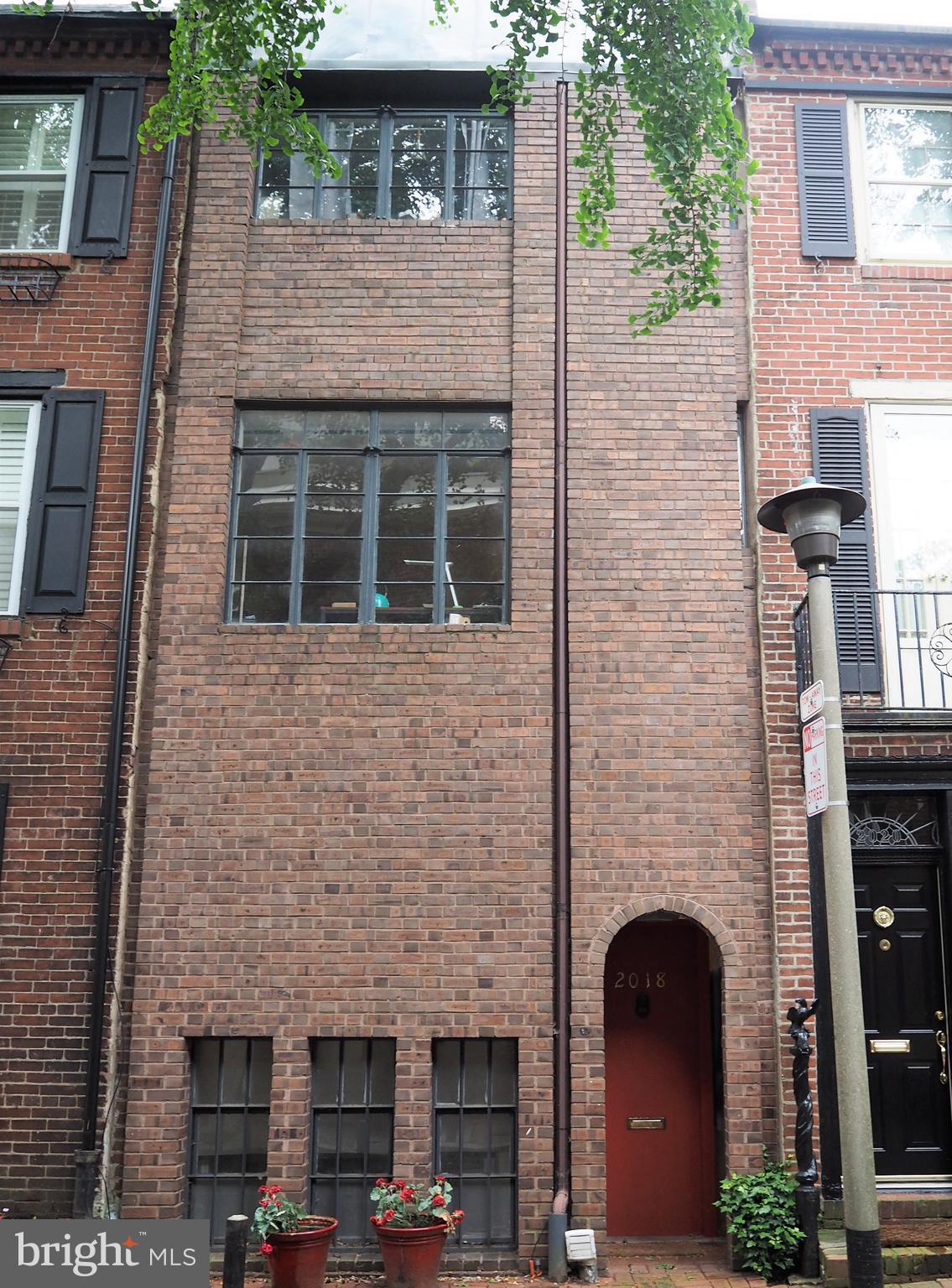 3 Bedroom/2.5 Bath home in Rittenhouse Square available for immediate occupancy! You will find this modern brick front home located on a quaint tree-lined street. The renovated kitchen is the heart of this home with high-end appliances including front loading washer and dryer. Off the kitchen is a dining room with built-in seating and storage, that is flooded with light from the 3 story window that spans the back of the house and overlooks the tranquil brick patio garden. The living room overlooks the patio as well and features a brick fireplace. The upper level has 2 good sized bedrooms, a bonus den area, and a full bathroom. The master suite is equipped with a walk-in closet, renovated ensuite bathroom, and a roof deck! Located in the Greenfield Catchment this home is surrounded by great restaurants and a quick walk to Rittenhouse Square, Fitler Square, and Schuylkill River Park.