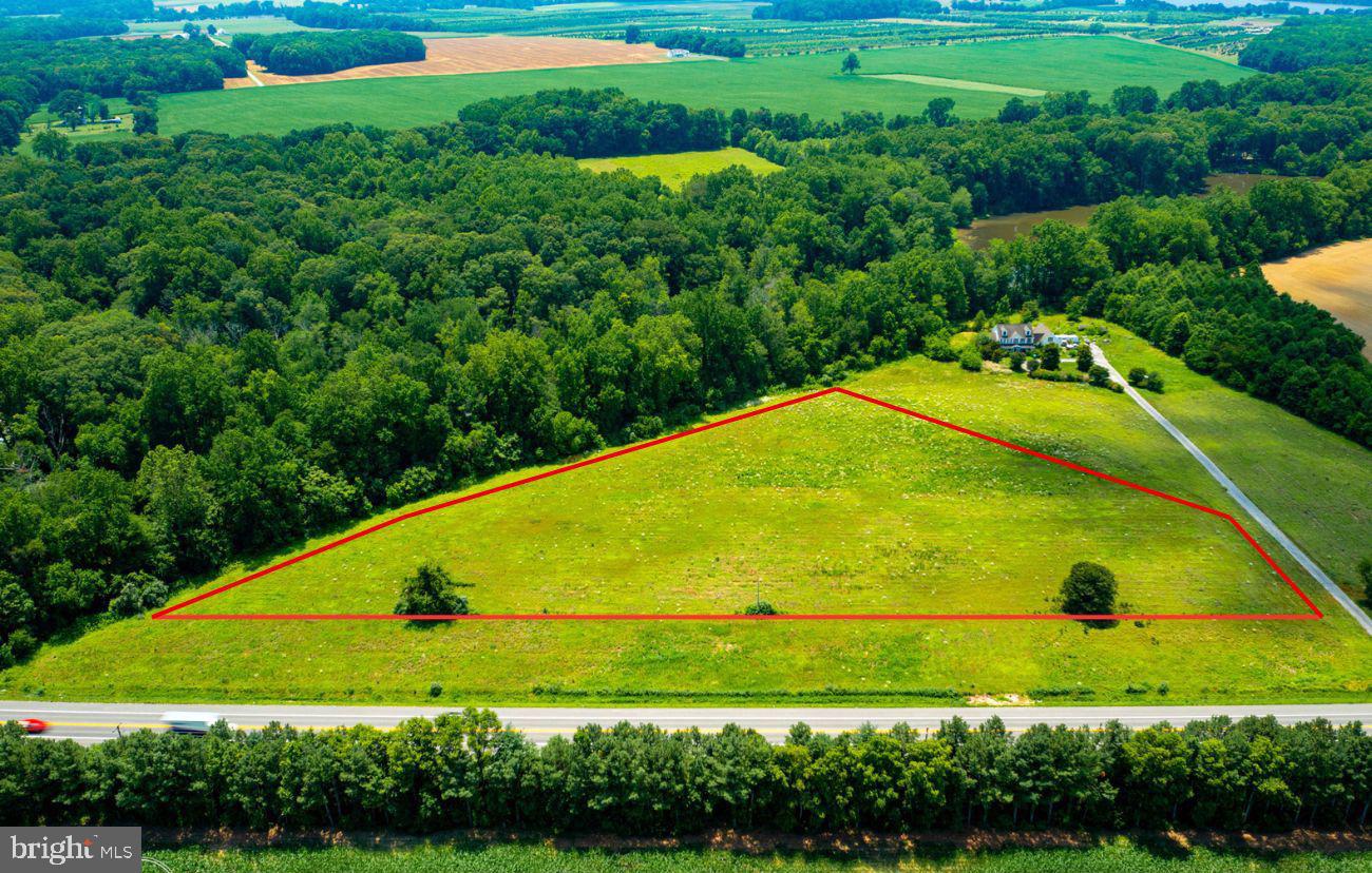 Fantastic opportunity to own over 5 acres of buildable, level farmland with two perc approval sites. AG Zoning allows a wide range of residential, outdoor recreational and commercial uses. Property recently surveyed with a custom site plan and ready for your building plans. Property backs to 60+ acre farm in a perpetual forest conservation easement. Right of ways from 213 and neighbors driveway allow two different access points to property. Entire property is tillable. No deeded covenants or restrictions. Easy access to Route 213, Chestertown, Church Hill and Centreville. AG Tax paid by current owner. Buyer to perform own due diligence. Do not enter property without an appointment.