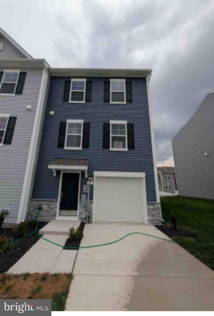End Unit Townhome for Rent Overlook at Riverside | Brand-New 3-Bed, 3.5-Bath

Step into modern comfort with this stunning brand-new end-unit townhome in the highly sought-after Overlook at Riverside community! Offering 3 bedrooms, 3.5 bathrooms, and a spacious layout, this home is perfect for those seeking style, functionality, and convenience.

Main Level:
As you enter, you're welcomed by a finished recreation room that can be used as a home office or a fourth bedroom, complete with a full bathroom ideal for guests or flexible living. The attached garage provides secure parking and additional storage space.

First Upper Level:
Make your way upstairs to an elegant open-concept main living area featuring luxury vinyl plank flooring and a bright, inviting atmosphere. The modern eat-in kitchen includes a large island, quartz countertops, stainless steel appliances, and direct access to a composite deck perfect for outdoor dining or relaxing. A convenient half bath completes this level, making it ideal for entertaining.

Second Upper Level:
The top floor features the primary suite with a spacious walk-in closet and a private en suite bath offering a dual-sink vanity and oversized seated shower. Two additional bedrooms, a full hallway bath, a linen closet, and a centrally located laundry area with washer and dryer complete this level.

Community Amenities:
Enjoy access to premium community features including a dog park, children's play area, basketball and tennis courts, and recreational open space all designed to enhance your lifestyle.

Prime Location:
Ideally situated for commuters with easy access to I-81, Rt 11, and I-70, and just minutes from the Maryland line. You'll love the beautiful mountain views and being within walking distance to shopping, dining, and Spring Mills schools.

May not last long at this Home for Rental in the Market, Call or schedule the tour