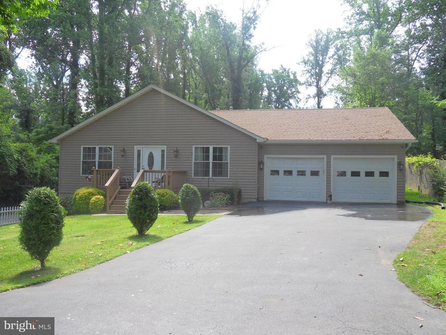 Home Sweet Home! Fall in love with this 2800 sq ft rambler 2 blocks from the Chesapeake Bay! Updated ktichen with smooth top cooktop, wall oven and center island. Entertain in formal living room, family room off kitchen or back deck. 2 BR downstairs with large rec area/2nd family room. No HOA! Boat ramp accessibility available for extra fee. This one won't last long!!