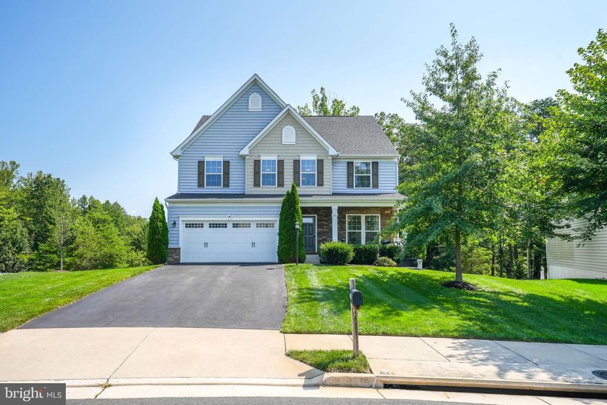 Welcome to your dream home, ideally situated just off Hoadly Road in the prestigious Hoadly Manor Estates. This exquisite Ryan Home boasts a gorgeous open floor plan that’s perfect for both entertaining and relaxing. KEY FEATURES - ELEGANT PRIMARY SUITE -Enjoy a luxurious primary bedroom with a spacious sitting room, multiple walk-in closets & a beautifully designed en-suite bathroom.  EXPANSIVE UPPER LEVEL - the upper floor includes generously sized bedrooms, a versatile loft, and a laundry room. Entire upper level has brand new carpet.  GOURMET KITCHEN & FORMAL SPACES - Enjoy cooking in the open kitchen with a large center island and a cozy morning room.  The main level also features formal living & dining rooms, and a huge family room with a gas fireplace.  The entire main level boasts sleek luxury vinyl plank flooring.  OUTDOOR OASIS -Step outside to a large deck overlooking a private backyard,, perfect for hosing gatherings.  WALK-OUT BASEMENT - Discover the impressive 40’ x 18’ recreation room , a full bath, an exercise room and your own home theatre.  This space is perfect for movie or game nights.  TOP-RATED SCHOOLS - Benefit from three great schools including Colgan High School which features a $113M campus with a magnet arts program and indoor swimming pools.   ADDITIONAL INFO - the seller is also open to selling most of the furniture so please inquire if you are interested.