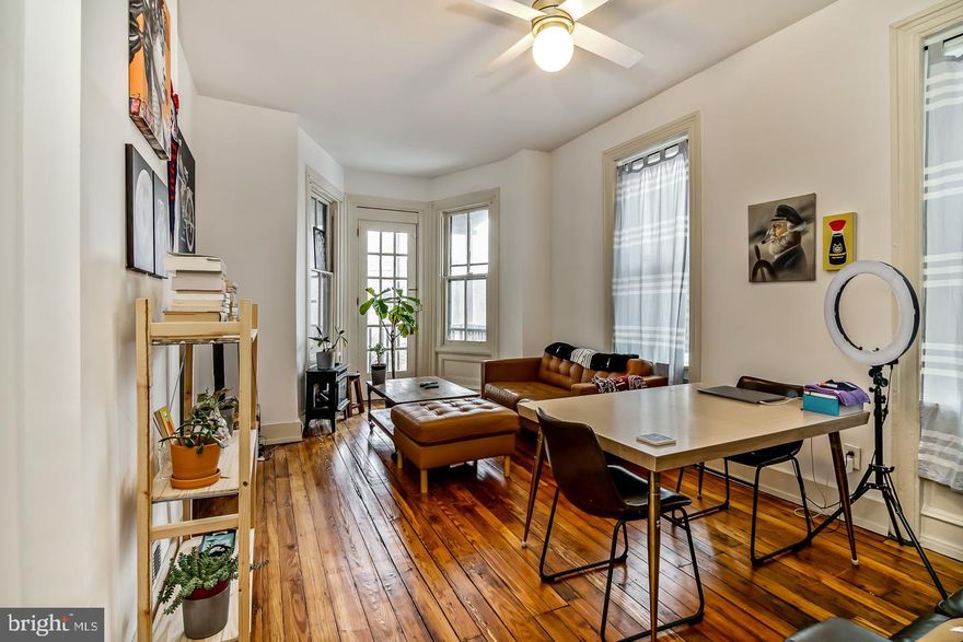 Welcome Home! This wonderful 5BR/3BA home in up and coming West Powelton is filled with original details, charm, flair, and Central Air . From the classic Philadelphia porch, step through the double doors with transom into the ornate vestibule. Notice the craftsmanship of the tile wall tile, passing into the hallway with original hardwood flooring. The living room still retains bespoke pocket doors ready for restoration. A full contemporary bathroom is situated on the first floor. The kitchen area is large and bright with stainless steel appliances, a concrete countertop, and stylish cabinetry with navy lower combined with white upper to provide a modern look counterbalanced with a built in pantry system. In the rear a laundry center and mud room, leads to the back yard. Notice the contemporary and fashionably consistent light fixtures throughout .The Central Air Conditioning and Heating system with digital thermostat, installed in 2020 uses cutting edge mini split units, to provide cooling and heating on the third floor. All bedrooms contain ceiling fans. There is also a small balcony on the second floor to catch a breath of fresh air. Windows are updated throughout. The front bedroom contains a fantastic original built in closet. This home is close to the Penn System Hospitals, Spark Therapeutics, Schuylkill Yards, University of Penn, Drexel, and the new University 3.0 office tower on the growing Market Street Technology Corridor and Center City. This area is growing by leaps and bounds as a booming biotech corridor develops in this West Powelton neighborhood.