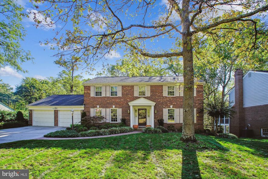 Nestled on a stunning lot, this beautiful center-hall colonial is a true gem, lovingly maintained and updated by its original owners. Located on a quiet, sidewalk-lined street with no through-traffic, this home offers an ideal blend of privacy and convenience within the sought-after McLean High School boundary. The backyard's wooded landscape, complete with views of Little Pimmit Run, creates a peaceful natural setting—perfect for relaxing or entertaining on the spacious deck and screened porch. Inside, the home features 5 bedrooms, 3.5 baths, and generous space for family and friends. The formal living room boasts recessed lighting, while the dining room is accented with crown and chair rail moldings. The family room, with its gas fireplace and beamed ceiling, provides a cozy spot for gatherings. The eat-in kitchen shines with granite countertops, a subway tile backsplash, glass display cabinets, a built-in desk, and a large pantry. A main-level laundry room and spacious storage closet with shelving add to the home’s practicality. Upstairs, the expansive primary suite offers two walk-in closets, a dressing area or office, and an ensuite bathroom with dual vanities, a tub, and a shower featuring a storage niche and corner seat. Three additional large bedrooms with recessed lighting and a full bathroom complete this level. The lower level is perfect for entertaining, with a massive walk-out recreation room, a wet bar, a fifth bedroom, and a full bathroom. The two-car garage and spacious driveway provide ample parking. Just minutes from both D.C. and downtown McLean, this home enjoys easy access to the GW Parkway, parks, and Chesterbrook Shopping Center. Newer roof (2020). Planned updates for late 2024 include refinishing hardwood floors on the main and second levels (no carpet), along with updated light fixtures and fresh paint throughout.