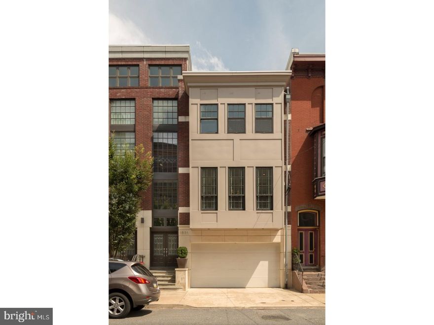 A dramatic, one of a kind, architects masterpiece home! A rare find in the City of Brotherly Love! This home runs from Christian St to Webster St and boasts desirable amenities including a 2-car garage, 50ft landscaped yard, 2 terraces, dramatic steel wood open rise floating staircase, rooftop deck (with out of this world skyline views!) and so much more, all spread across 3000+++sqft! The first floor hosts a media room and a bedroom/den with wide plank Brazilian cherry hardwood floors, stone gas fireplace, a full contemporary bathroom and glass doors to landscaped yard with patio. Behold the second floor wide open living room and dining room complete with an abundance of dramatic windows, a gas fireplace and detailed crown molding. Modern custom kitchen features a granite island, Fischer/Picale stainless steel appliances, Nile exhaust fan, Kohler Zero sink, Wenge custom cabinetry and indirect pendant lighting. Lovely deck for coffee or drinks! The 3rd floor offers 2 bedrooms & 2 contemporary designer baths. On the 4th floor you'll find the pilot house complete with a stylish kitchenette leading out to the rooftop deck with unbelievable views! Words can't describe... you have to see it to believe it!