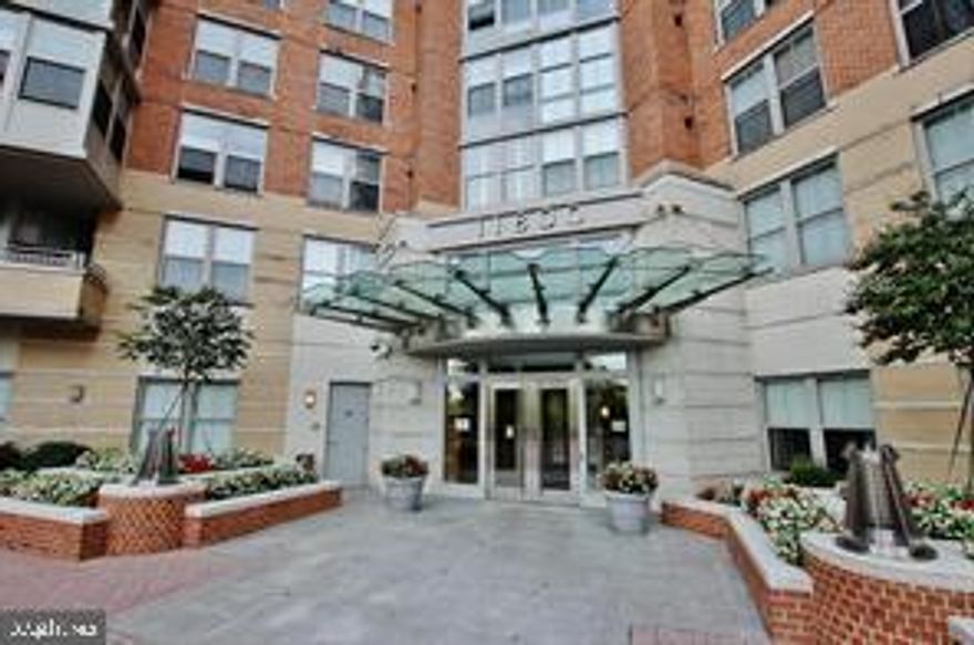 Downtown Reston Living at the Carlton House, Beautiful well-maintained building and plenty of security. Offers many amenities to relax after a long day at work, roof top pool, billiards, Fitness Center etc. This 1 Bedroom condo includes and 1 car garage parking spot. The Condo is an open floor plan for entertaining comes with an enclosed sunroom overlooking trees great for home office or just a place to relax and enjoy the view.   lots of natural light, A large size Primary bedroom with a walk-in closet.  This condo is within walking distance to both the Wiehle-Reston East Station and Reston Town Center station also walking distance to shopping and entertainment at Reston town center. Many activities offered throughout the year at the center as well.
