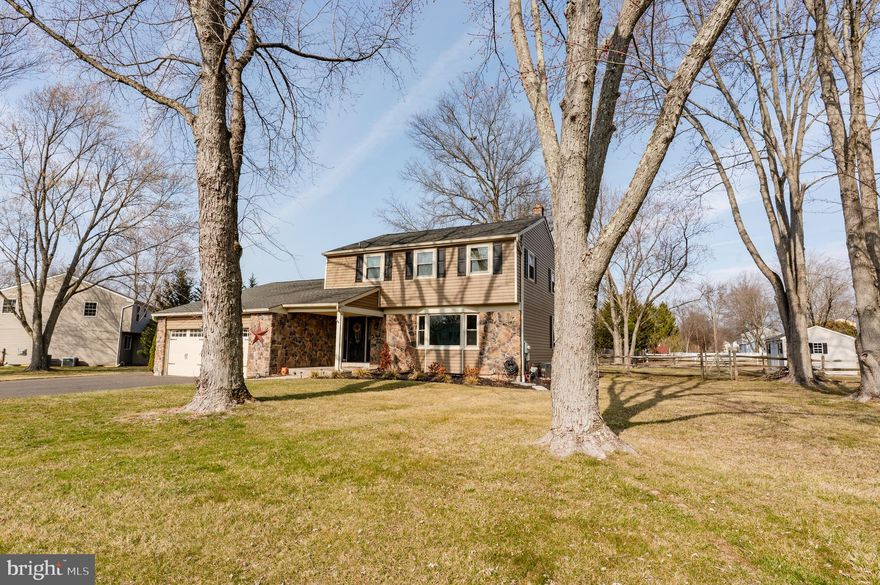 Discover Your Ideal Family Home. Stop right here and explore the perfect place for your family to grow and thrive! Nestled in a tranquil neighborhood of Hatfield, this spacious 4-bedroom, 2.5-bathroom home sits on over a half acre, offering ample space for everyone. As you step inside, you’ll find a well-lit formal living room seamlessly connected to a dining room, ideal for hosting holiday celebrations. The sunken family room, complete with a cozy gas-burning fireplace and sliding doors to the yard, invites relaxation and gatherings. The open eat-in kitchen boasts granite countertops, self-closing cabinets, and stainless steel appliances — perfect for the home chef. The first floor features stunning new floors that enhance the beauty and warmth of the living spaces. Venture off the kitchen to discover a finished basement, an excellent space for movie nights or a home gym, along with plenty of storage. Upstairs, the master bedroom features double closets and an updated en-suite bathroom, providing a private retreat. Three additional bedrooms and an updated hall bathroom enhance the roomy layout of this lovely home. Step outside to the expansive fully fenced backyard, complete with a 16x12 storage shed, perfect for entertaining or unwinding by the fire pit. A spacious two-car garage adds to the convenience. Best of all, you’re just steps away from the park, offering additional recreational opportunities. Rest easy knowing that major updates have been taken care of, including new windows, HVAC, hot water heater, and roof. Enjoy easy access to the community pool for added recreation. All you need to do is move in and love where you live!