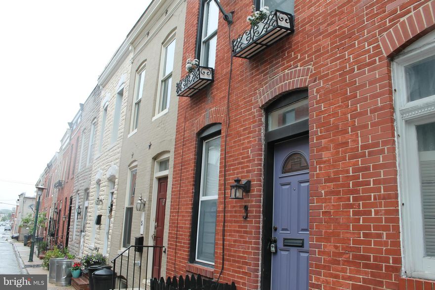 Just steps from Patterson Park.  Parking pad.  Quiet street with little traffic.  2 YO Lennox and cooling system. Tile floors in kitchen.  Laminate wood floors in living room and on first floor. Powder room on first floor. Sewer line recently repaired and replaced.  Recently updated full bath.  ADT Alarm System.  Motivated sellers. Priced to sell.  BRING AN OFFER!