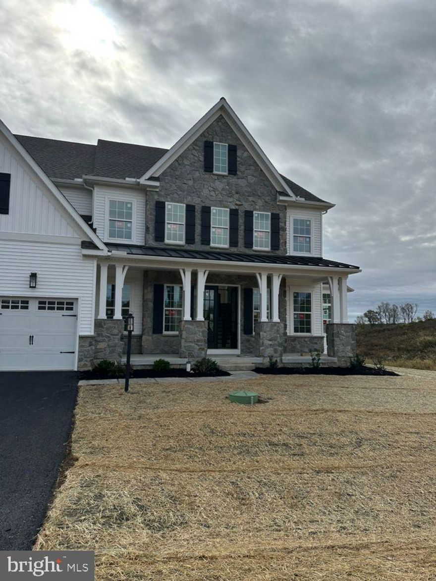 Key Features: Open concept main living are includes the Chef's Kitchen, 2-story Family Room, and Breakfast Area // Kitchen features a large eat-in island, quartz countertops that extend as backsplash, gas range, and stainless steel appliances // 2-story Family Room boasts a gas fireplace and coffered ceiling
1st-floor Guest Suite with ensuite full bath and walk-in closet  // Owner's Venetian Bath includes a dual vanity, soaker tub, tiled shower, and private water closet // Jack-and-Jill Bath connecting Bedrooms 3 & 4
Basement Cafe and Powder Room // This Devonshire Vintage is a thoughtfully designed 5-Bedroom, 3 Full & 2 Half Bathroom home with an open floorplan, 1st-floor Guest Suite, 2 staircases, and partially-finished basement. Inside the Foyer, you are greeted with an open staircase and hallway that leads into the main living area of the home. To the left, discover a formal Dining Room room that features a tray ceiling, and to the right, a Living Room that flows into a Library Nook and Conservatory. The Library Nook showcases built-in shelving and wall sconces, while the sun-soaked conservatory features expansive windows and a cathedral ceiling. The beautiful 2-story Family Room features a gas fireplace with trim, coffered ceiling, and a large wall of windows, bringing in abundant natural light. The Family Room seamlessly opens to the Breakfast Area and Chef's Kitchen, creating the perfect entertaining layout. The Chef's Kitchen includes a large eat-in island, quartz countertops that continue as backsplash, cabinets to the ceiling, double wall oven, stainless steel appliances, and large cove molding. A Butler's pantry connects the Kitchen to the Dining Room and offers a walk-in Pantry with shelving for food storage. Behind the Kitchen you'll find a hallway that leads to the first-floor Guest Suite with ensuite full bath, a door to the garage, built-in bench with pegs, and a second staircase leading upstairs. On the second floor, the spacious Owner's Suite has 2 walk-in closets, a tray ceiling, and a Venetian Bath. This luxurious bath showcases a freestanding soaker tub, double bowl vanity with quartz countertops, tiled shower with heavy glass surround, a separate water closet, and tiled flooring. Down the hall are 3 additional bedrooms. Bedrooms 3 and 4 share a Jack-and-Jill Bath, and all 3 bedrooms feature a walk-in closet. The Laundry Room is conveniently located on the same floor as all of the bedrooms. A partially finished walk-out Basement includes an additional 1,308 square feet of entertaining space with a Basement Cafe and Powder Room, along with 973 square feet of unfinished space for storage or future expansion. 

Welcome to Trails at Marsh Creek, a community of new homes in Glenmoore, PA. This stunning community features 101 homesites in total. Homeowners will enjoy natural walking trails intertwining through the landscape. Available homesites in Glenmoore back up to green space or trees, offering ideal views and privacy. The Trails at Marsh Creek community offers a convenient Chester County location on Devereux Road near Marsh Creek State Park, which features trails, watersports, shoreline, fishing, and more! Commuting is a breeze, with easy access to I-76 and US-322. Downingtown and Exton are 15 minutes away where you'll find an abundance of restaurants, grocery stores, shops, and cozy spots like Mean Bean Coffee & Cream, just minutes away from this community. Trails at Marsh Creek offers a variety of customizable floorplans, each with over 10,000 structural and decorative customizations. Looking for more customization? Additional changes are available through our Design Time option. Your Designer will be with you every step of the way to help bring your vision to life. Our quality homes are backed with an industry-leading 20-year warranty structural warranty. Learn more about how Keystone Custom Homes are 80% more efficient than used homes and 50% more efficient than other new homes.