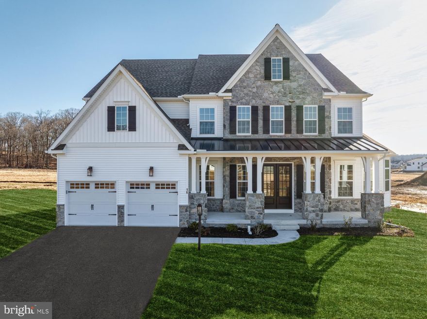 Key Features: Open concept main living are includes the Chef's Kitchen, 2-story Family Room, and Breakfast Area // Kitchen features a large eat-in island, quartz countertops that extend as backsplash, gas range, and stainless steel appliances // 2-story Family Room boasts a gas fireplace and coffered ceiling
1st-floor Guest Suite with ensuite full bath and walk-in closet  // Owner's Venetian Bath includes a dual vanity, soaker tub, tiled shower, and private water closet // Jack-and-Jill Bath connecting Bedrooms 3 & 4
Basement Cafe and Powder Room // This Devonshire Vintage is a thoughtfully designed 5-Bedroom, 3 Full & 2 Half Bathroom home with an open floorplan, 1st-floor Guest Suite, 2 staircases, and partially-finished basement. Inside the Foyer, you are greeted with an open staircase and hallway that leads into the main living area of the home. To the left, discover a formal Dining Room room that features a tray ceiling, and to the right, a Living Room that flows into a Library Nook and Conservatory. The Library Nook showcases built-in shelving and wall sconces, while the sun-soaked conservatory features expansive windows and a cathedral ceiling. The beautiful 2-story Family Room features a gas fireplace with trim, coffered ceiling, and a large wall of windows, bringing in abundant natural light. The Family Room seamlessly opens to the Breakfast Area and Chef's Kitchen, creating the perfect entertaining layout. The Chef's Kitchen includes a large eat-in island, quartz countertops that continue as backsplash, cabinets to the ceiling, double wall oven, stainless steel appliances, and large cove molding. A Butler's pantry connects the Kitchen to the Dining Room and offers a walk-in Pantry with shelving for food storage. Behind the Kitchen you'll find a hallway that leads to the first-floor Guest Suite with ensuite full bath, a door to the garage, built-in bench with pegs, and a second staircase leading upstairs. On the second floor, the spacious Owner's Suite has 2 walk-in closets, a tray ceiling, and a Venetian Bath. This luxurious bath showcases a freestanding soaker tub, double bowl vanity with quartz countertops, tiled shower with heavy glass surround, a separate water closet, and tiled flooring. Down the hall are 3 additional bedrooms. Bedrooms 3 and 4 share a Jack-and-Jill Bath, and all 3 bedrooms feature a walk-in closet. The Laundry Room is conveniently located on the same floor as all of the bedrooms. A partially finished walk-out Basement includes an additional 1,308 square feet of entertaining space with a Basement Cafe and Powder Room, along with 973 square feet of unfinished space for storage or future expansion. 

Welcome to Trails at Marsh Creek, a community of new homes in Glenmoore, PA. This stunning community features 101 homesites in total. Homeowners will enjoy natural walking trails intertwining through the landscape. Available homesites in Glenmoore back up to green space or trees, offering ideal views and privacy. The Trails at Marsh Creek community offers a convenient Chester County location on Devereux Road near Marsh Creek State Park, which features trails, watersports, shoreline, fishing, and more! Commuting is a breeze, with easy access to I-76 and US-322. Downingtown and Exton are 15 minutes away where you'll find an abundance of restaurants, grocery stores, shops, and cozy spots like Mean Bean Coffee & Cream, just minutes away from this community. Trails at Marsh Creek offers a variety of customizable floorplans, each with over 10,000 structural and decorative customizations. Looking for more customization? Additional changes are available through our Design Time option. Your Designer will be with you every step of the way to help bring your vision to life. Our quality homes are backed with an industry-leading 20-year warranty structural warranty. Learn more about how Keystone Custom Homes are 80% more efficient than used homes and 50% more efficient than other new homes.