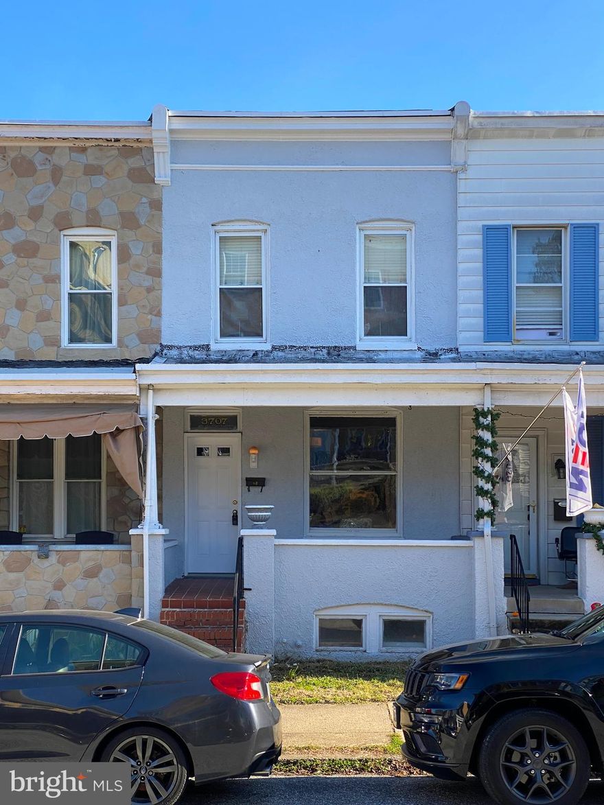 LARGE 3 bedroom 2 bath porchfront townhouse in the Sweet Spot of Hampden with over 1,700sq ft of living space-renovated but with plenty of original Hampden charm! High ceilings throughout, original hardwood floors and staircase, large kitchen with original tin ceiling and walkout to iron deck overlooking rear yard and parking pad! Kitchen includes new granite, sink & faucet plus a new dishwasher and a new refrigerator is on order! There are 3 bedrooms on the 2nd level plus full bath, crown moldings and skylight.  Enormous 22'x12' lower level finished family room or 4th bedroom  with 8 ft ceilings, carpet and crown moldings plus full bath. Walkout from the lower level to the rear yard and parking! 1 1/2 blocks to the "Avenue", 2 blocks to the Rotunda, close to Hopkins and so much more!