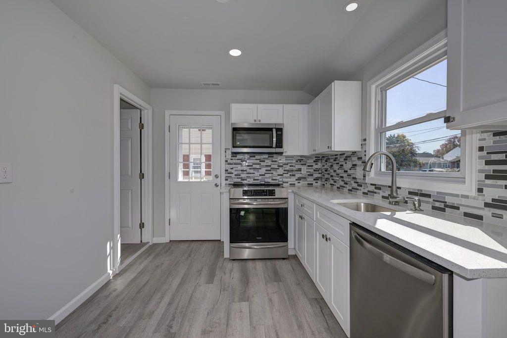 Photo of 477 Buttonwood Avenue, MAPLE SHADE, NJ 08052 (MLS # NJBL2098260)