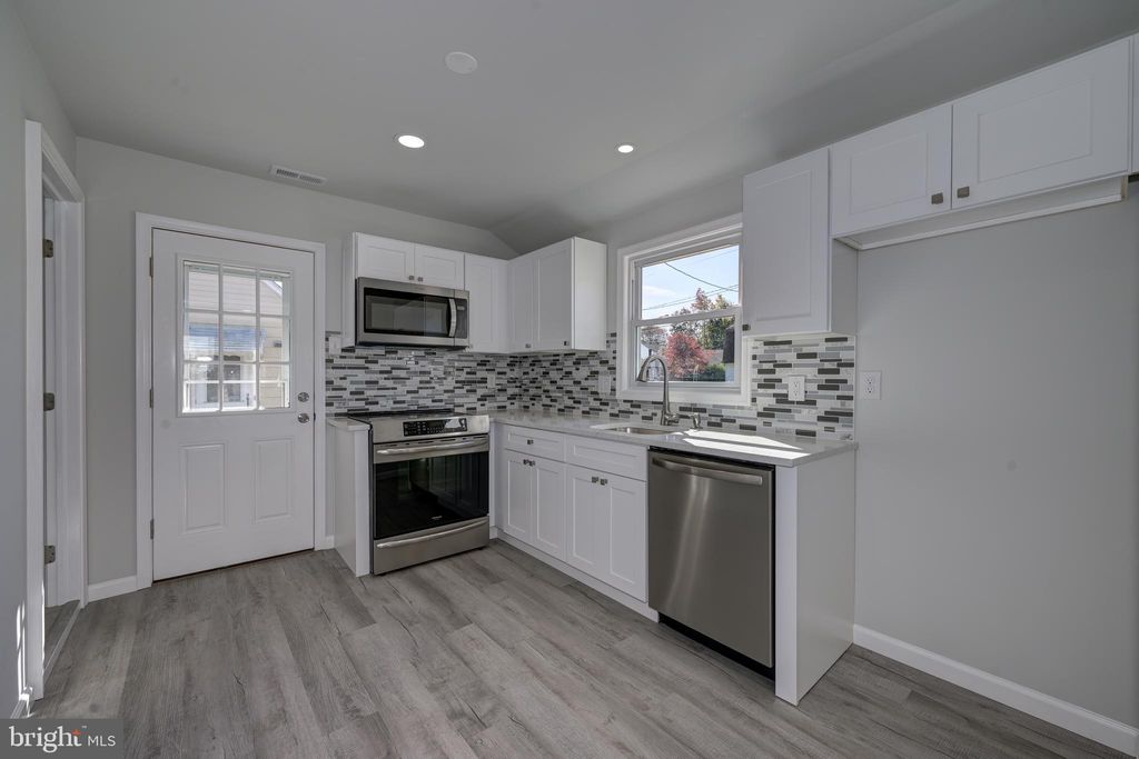 Photo of 477 Buttonwood Avenue, MAPLE SHADE, NJ 08052 (MLS # NJBL2098260)