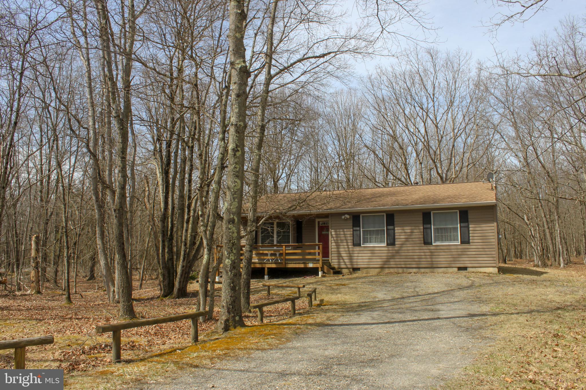 Spring is here Welcoming you to Your beautiful, well maintained 3 Bedrooms, 1 bath DREAM Home that sits on 0.43 acres of open space. Driveway fits several cars.
The spacious living room awaits your decision for entertainment or total relaxation.
The kitchen and dining area is also ready for your scrumptious meals.
Step outside to a large deck with a barbecue area and an impeccable spacious backyard.
The Indian Mountain Lakes Gated Community offers access to multiple swimming Pools, Fishing Lakes, Basketball courts, the Clubhouse and many more amenities.
This home is in an ideal location with a short drive to activities the Pocono has to offer.
Don't wait! Schedule your appointment today! Some Furniture included.