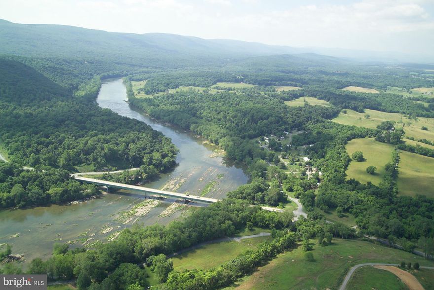 Exceptional 7+ acre  view lot on a hillside with great views to and down the Shenandoah River and Blue Ridge Mountains. 4BR perc.  Perc site marked on property. Paved access road. Convenient location,  50 minute drive to DC Beltway, 15 to Leesburg, 30 to Frederick, Md., 15 to Marc Commuter. Just a lovely, beautiful, serene spot.  Great sunsets. Neighborhood of fine homes. Rare find.  Owner financing available.