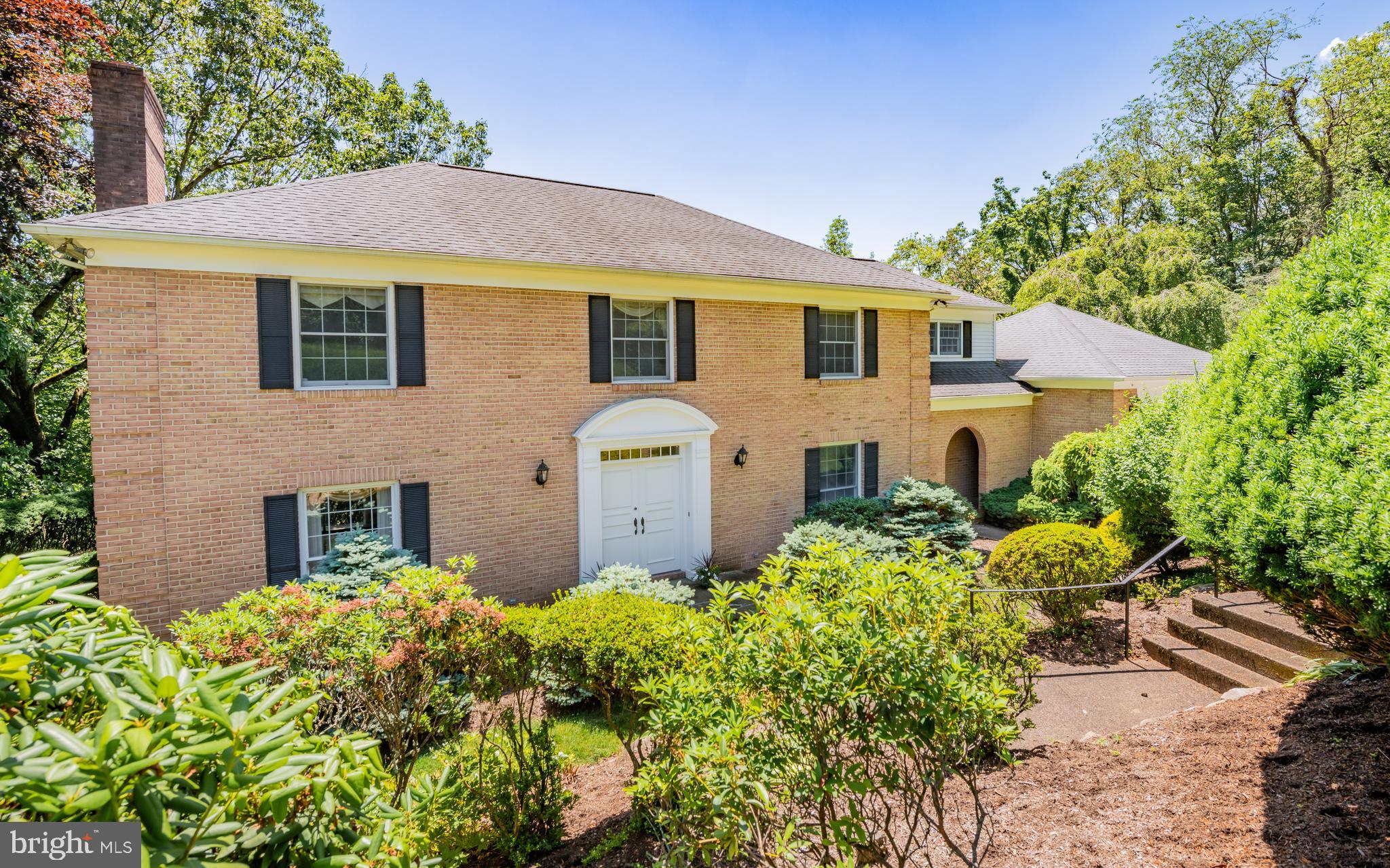 BACK ON MARKET AT NO FAULT OF HOME / BUYERS' HOME DID NOT SELL.
Perched atop Grampian Hills, this stately brick colonial was custom-built in 1974 by Frank Lundy for his own personal use. Thoughtfully designed for both daily living and entertaining, the home has been meticulously maintained by its current owners for over 33 years. Overflowing with charm, every corner of this timeless home, reflects its one-of-a-kind character. A grand foyer with ceramic tile and a sweeping spiral staircase welcomes you in. The sunken living room features natural cherry floors and spans front to back with sliding doors overlooking mature hedges. The elegant dining room offers corner built-ins, wainscoting, and a bay window which brings the outdoors in.
The renovated kitchen is the heart of the home, featuring beautiful cherry cabinetry, tile flooring, generous counter space, and large picture windows perfect for birdwatching and other wildlife sightings. A cozy family room off the kitchen area, opens to a serene flagstone patio, offering tranquil views all year round.
Upstairs, the master suite includes a walk-in closet, private bath, and a bonus room ideal for an office, nursery, or reading nook. Three additional spacious bedrooms, a 2nd floor laundry room, and an additional full bath, complete the 2nd level. The partially finished basement includes a media space with surround sound and plenty of storage, plus access to the oversized, 2-car garage.
Nestled on over an acre of beautifully landscaped land with a large fenced yard, this exceptional property offers privacy, ample space, and peaceful living, and is only minutes from town!