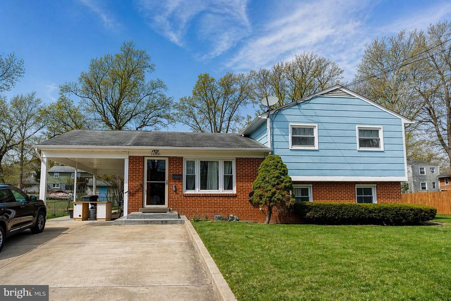 Welcome home to this beautifully maintained 3-level single-family residence, ideally located just minutes from I-95, Route 123, and multiple commuter lots—perfect for easy commuting. Step inside to a warm and inviting entrance that flows into a spacious living room, which opens seamlessly to a bright dining area, ideal for everyday living and entertaining. The updated kitchen is both stylish and welcoming, making it a great space for cooking and gathering. Upstairs features three generously sized bedrooms and a full bath, while the lower level offers additional living space with a second living room, a versatile rec room, and a bonus fourth bedroom complete with a private full bath—perfect for guests, extended family, or a home office. This home truly shines with pride of ownership throughout, and outside you’ll find a large, level front and backyard, perfect for relaxing or entertaining, along with an extended concrete driveway and carport that provide plenty of parking. Priced exceptionally well, this is an incredible opportunity you don’t want to miss—schedule your showing today!