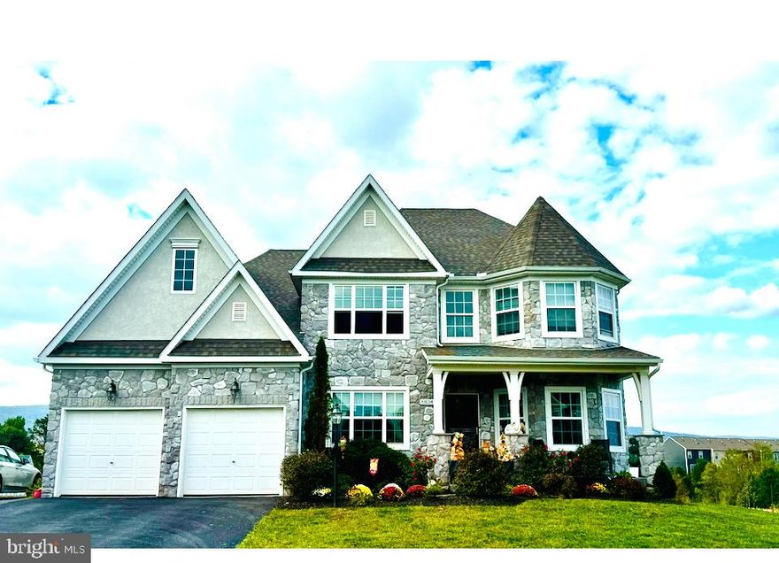 ** Welcome to This Immaculate 7-Years-Young, Stone-Front Nottingham Model on a Peaceful Cul-de-Sac! From the moment you step into the inviting foyer, you’ll feel at home. To the left, a charming study offers the perfect space for a home office, while the elegant dining room, accented with classic Craftsman trim, sets the scene for memorable gatherings. A well-designed hallway guides you past a convenient powder room and into a spacious laundry room with dual access from both the entryway and the luxurious main-level primary suite. This serene retreat features two walk-in closets and a spa-inspired Venetian bath complete with a freestanding soaking tub and a large, luxury shower. The stunning two-story family room is the heart of the home, offering a cozy gas fireplace and seamless flow into the sun-filled breakfast area and chef’s garden kitchen. The kitchen is a dream—equipped with a gas stove, farm sink, quartz countertops, generous seating, and direct access to a walk-in pantry and coffee bar. Large windows and sliding glass doors fill the breakfast area with natural light, creating a bright, welcoming atmosphere. Upstairs, you'll find three generously sized bedrooms, each with its own walk-in closet, and a full hall bath with tub. The mostly finished lower level is designed for entertaining, featuring a spacious open rec area with a wet bar, a half bath, and a large storage/utility room with two hot water heaters and a workbench. A walk-out leads to the expansive, fully fenced, and level backyard—complete with a large patio and firepit, perfect for outdoor living. Trees have recently been added to provide additional privacy. An attached two-car garage completes this exceptional home. Located just a short  stroll from Clover Hill Park, a 13-acre park featuring a paved path, swimming pool, clubhouse, and pavilion. The park also hosts the community’s youth programs, including Clover Hill Baseball and the Clover Hill Hurricanes swim team. Year-round events bring neighbors together for fun and connection. Enjoy the convenience of being just minutes from shopping and dining in Downtown Frederick, with easy access to major commuter routes — all with no city taxes. Don’t miss your chance to own this stunning property.