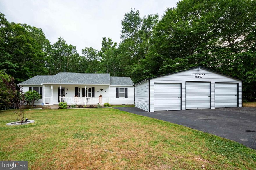 PRIVACY is the word for this ADORABLE Rambler that sits on  a quiet private road with over 4 acres of land! Beautiful flooring throughout. This well maintained home has an Open Floor Plan with Master bedroom and bath nicely situated on one side, while the other 2 bedrooms and updated full bath have their own area. New 2019 Roof and Ridge Vents with high quality Architectural shingles with  50 Year Warranty.   A transferable lifetime warranty on Thompson Creek Windows, replaced 4 years ago. In the kitchen, newer appliances, freshly painted  cabinets, and a new floor. Enjoy the sight of deer, a fox and many birds as you grill or relax on the recently renovated deck. Fenced in backyard. 21' x 30'  detached  3 car Garage with a rear garage entrance to maintain the automobiles, use as a work area  or for storage. No HOA. Home Warranty. Easy commute to Pax River.