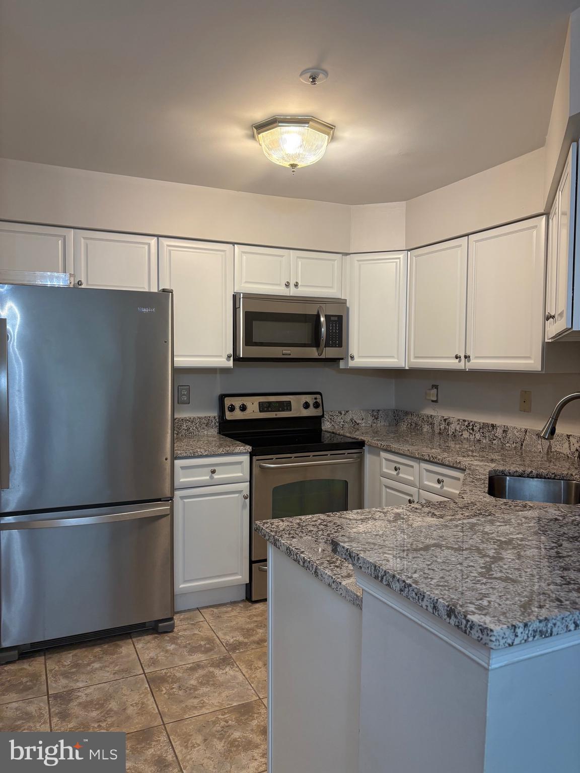 Check out this beautiful first floor condo. view of the stream and woods. A block away from the Village Shopping Center. Two minutes away from RT 29 via RT 108. Hardwood floors, tile, and new carpet. Two sliders to the private patio. Two bedrooms with full baths connected to both. Stainless steel GE appliances with slow-close cabinets, and granite counter tops in the kitchen. Washer and dryer in unit!