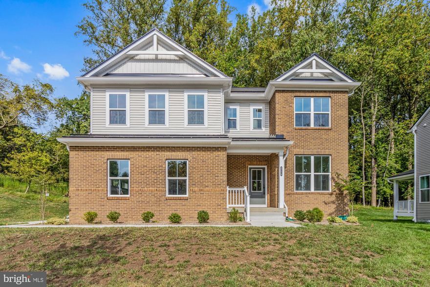 Stunning New 5-Bedroom Beazer Home with Tesla Solar Package and Private Wooded Backyard

Discover the perfect blend of modern luxury and eco-friendly living in this beautiful new construction Beazer home, featuring a Tesla Solar Package. This spacious 5-bedroom, 3.5-bath home welcomes you with a covered entry and stylish LVP flooring throughout the entry level. A dedicated first-floor office offers the ideal space for remote work, and the half bath adds extra convenience.

The gourmet kitchen is a chef’s dream, boasting white shaker cabinets, a cooktop, double wall oven, and stainless steel appliances. An oversized island with pendant lighting and a walk-in pantry complete the space, which opens to an eating area and a cozy family room with a fireplace. Sliders lead out to a private, wooded backyard, perfect for relaxing or entertaining.

Upstairs, the primary suite is a luxurious retreat with coffered ceilings, recessed lighting, and a spacious walk-in closet. The en suite bathroom features a soaking tub, frameless stand-up shower, a double vanity, and a sense of serene indulgence. Three additional bedrooms share a hall bath, and a large laundry room is conveniently located on this level.

The finished lower level includes a recreation room, a fifth bedroom, a full bathroom, and a storage room, offering endless possibilities for additional living or guest space. The home also includes a two-car side entry garage.

Set in a tranquil, wooded setting, this home combines luxury, comfort, and sustainability. Don't miss out on this incredible opportunity!