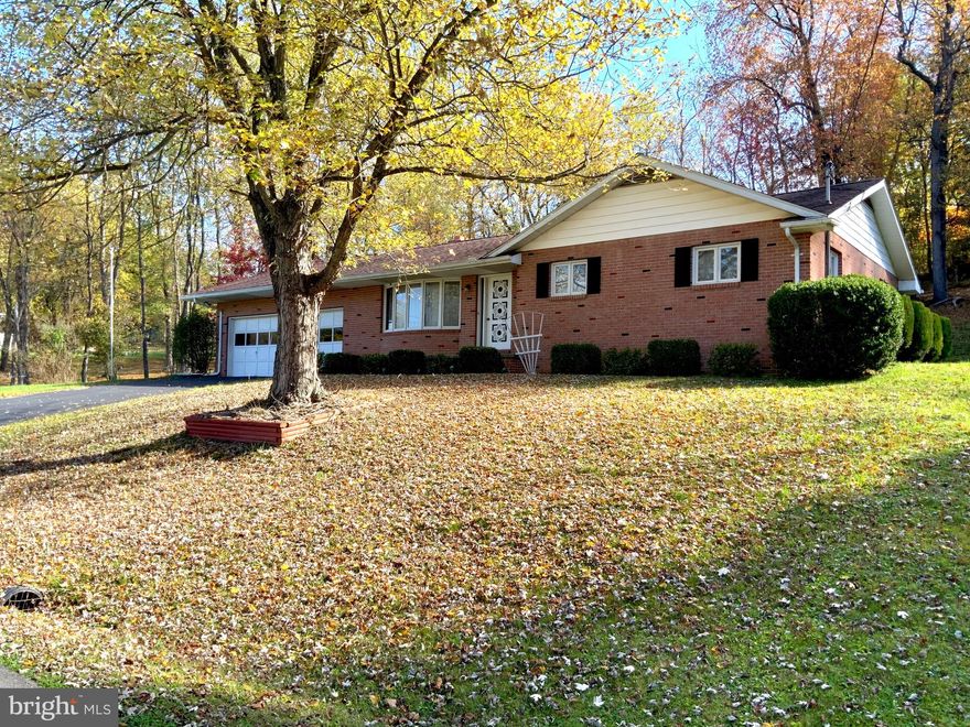 LOOKING FOR A LITTLE PIECE OF HEAVEN IN  WILD WONDERFUL WEST VIRGINIA?   HERE IT IS! THIS LOVELY ALL BRICK RANCHER SITS ON 1.37 ACRES.  THE HOME FEATURES A  SPACIOUS  2 CAR GARAGE AND 2 BRICK,  WOOD BURNING FIREPLACES. THERE IS AN ENCLOSED  PORCH TO ENJOY SPRING, SUMMER, AND FALL DAYS. THE FULL BASEMENT IS WAITING FOR YOU TO FINISH ANY WAY YOU PLEASE. DON'T DELAY,  THIS ONE  WON'T LAST.