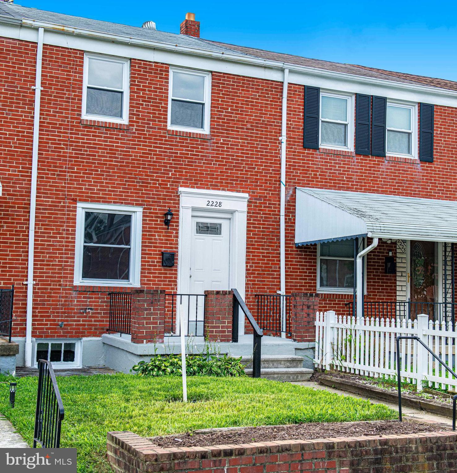 Searching for turnkey perfection. 2228 Firethorn Road is a must-see. This brick row home in the heart of Middle River was renovated in 2025, giving you all the benefits of a brand-new home without the wait. From the moment you step inside, you'll love the warm wood floors that flow through the main living areas and the seamless open layout connecting the living room, dining room, and kitchen, ideal for entertaining or everyday comfort. The modern kitchen is a showstopper with stainless steel appliances, crisp white 42" shaker-style cabinets, subway tile backsplash, and recessed lighting. A bonus sunroom just off the kitchen is ideal for a breakfast nook, reading room, or home office and leads right out to a generous off-street parking pad. Upstairs, you’ll find three spacious bedrooms featuring new carpet and ceiling fans, plus a stylish full bath with subway tile tub/shower surround. The fully finished lower level offers serious bonus space with luxury vinyl plank flooring, tall ceilings, recessed lighting, a laundry area, and extra storage space. Schedule your showing today and enjoy peace of mind, modern finishes, and instant comfort—no projects, no delays, just home.