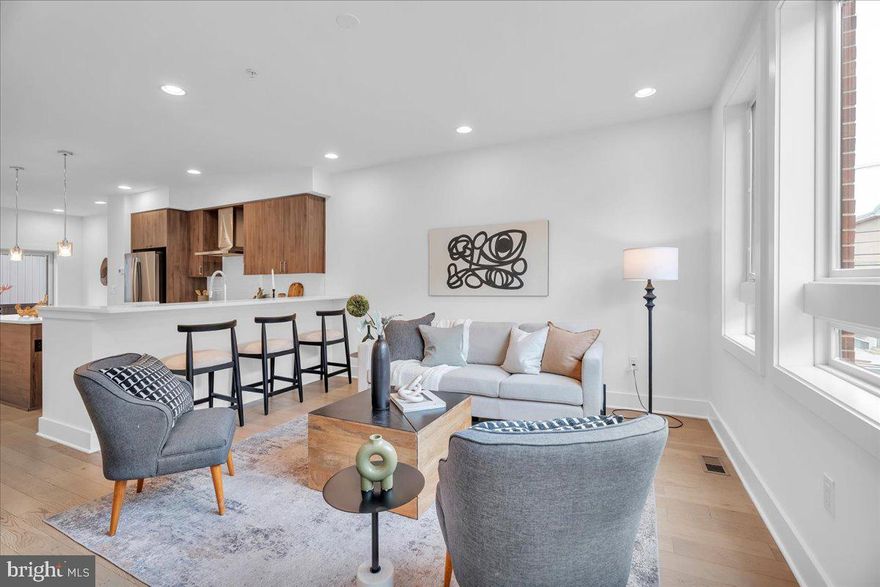 Welcome to The Quarters at Fairmount—a premier community in the heart of Northern Liberties. This 3 bed, 3.5 bathroom home comes equipped with a private garage and expansive roof deck. The main level showcases a beautiful kitchen complete with stainless steel appliances, custom cabinetry, and an open layout that flows seamlessly into the spacious living area ideal for entertaining or relaxing. Upstairs, you’ll find three generously sized bedrooms with ample closet space and large windows that flood each room with natural light. The top level leads to a private roof deck with sweeping skyline views. Residents also enjoy beautifully landscaped community gardens and shared outdoor spaces, all while being just minutes from public transportation, shopping, and some of the city’s best dining destinations. Taxes and square footage are the responsibility of the buyer to have verified independently.