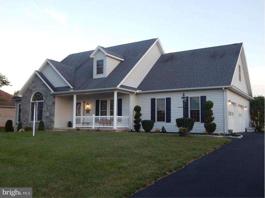 ABSOLUTELY STUNNING! This Cape Cod has hardwood floors, fireplace, beautiful kitchen with new stainless steel appliances,built in bookcases,3 full baths, main level laundry room with half bath, master bedroom on main level, hook up for generator, full walkout basement, gorgeous back yard and a finished upper level suite with heat pump! Near Penn national golf community.Home Warranty included.