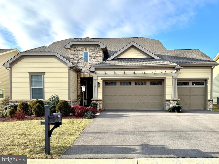 NEW PRICE! Escape to the Resort Lifestyle at Shenandoah in Lake Frederick! Discover the elegance and ease of 55+ living at 114 Turnstone Lane, a premier residence situated mere moments from the community's impressive clubhouse and amenities. This is more than a home; it's your gateway to an unparalleled resort lifestyle.
The home is the stunning Elate Model, designed for effortless luxury with main-level living and a finished basement. Its rare 3-car garage offers not just parking but room for a workshop or storage. The open-concept heart of the home flows seamlessly from a large, welcoming foyer into a great room anchored by a chef-inspired kitchen with an immense island with seating, and a professional 5-burner gas cooktop. This open, sunlit area also features a living room with a cozy fireplace and a dedicated dining area, all with hardwood flooring. Step out onto the private porch, where strategically placed trees offer a peaceful sense of nature and privacy.  The space is perfect for entertaining and ease of daily living.
The luxurious main-level primary suite is a true retreat, with a spa-like bath featuring a tiled walk-in shower, dual vanities, and a generous walk-in closet. There is also a private entrance to the rear porch.  The second main-level bedroom has an en-suite bath and is situated away from the primary bedroom for privacy. The main level also has a powder room and a laundry room.
Designed for the ultimate entertaining experience, the lower level features an expanded family room. The finished space can easily be divided into a place for card playing, puzzles, or games, and a place to watch your favorite sports. There is an area that has been preplumbed for a bar, coffee station, or small kitchenette. A private third bedroom, full bath, and extensive storage complete the space. 
Imagine your days filled with lakeside fun with direct access to Lake Frederick for fishing, canoeing, and kayaking, or a delicious meal at the renowned Regions 117 restaurant. Stay active and connected with an expansive clubhouse featuring indoor and outdoor swimming pools, a state-of-the-art exercise room, pickleball, and tennis courts, and too many activities and learning opportunities to list. Stroll or bike for miles along scenic paved paths, weaving through a nature-filled community.
Enjoy the perfect balance of luxury and location, with easy access to shopping, the Winchester Hospital complex, and major commuter routes.
 ASK US HOW YOU CAN SAVE UP TO $2300 IN CLOSING COSTS BY FINANCING WITH PENTAGON FEDERAL CREDIT UNION VIB (VERY IMPORTANT BUYER) PROGRAM WITH COMPETITIVE RATES AND THE OPTION TO REFI WITHIN 3 YEARS WITH THE SAME  SAVINGS!
(Square footage is taken from county records.)