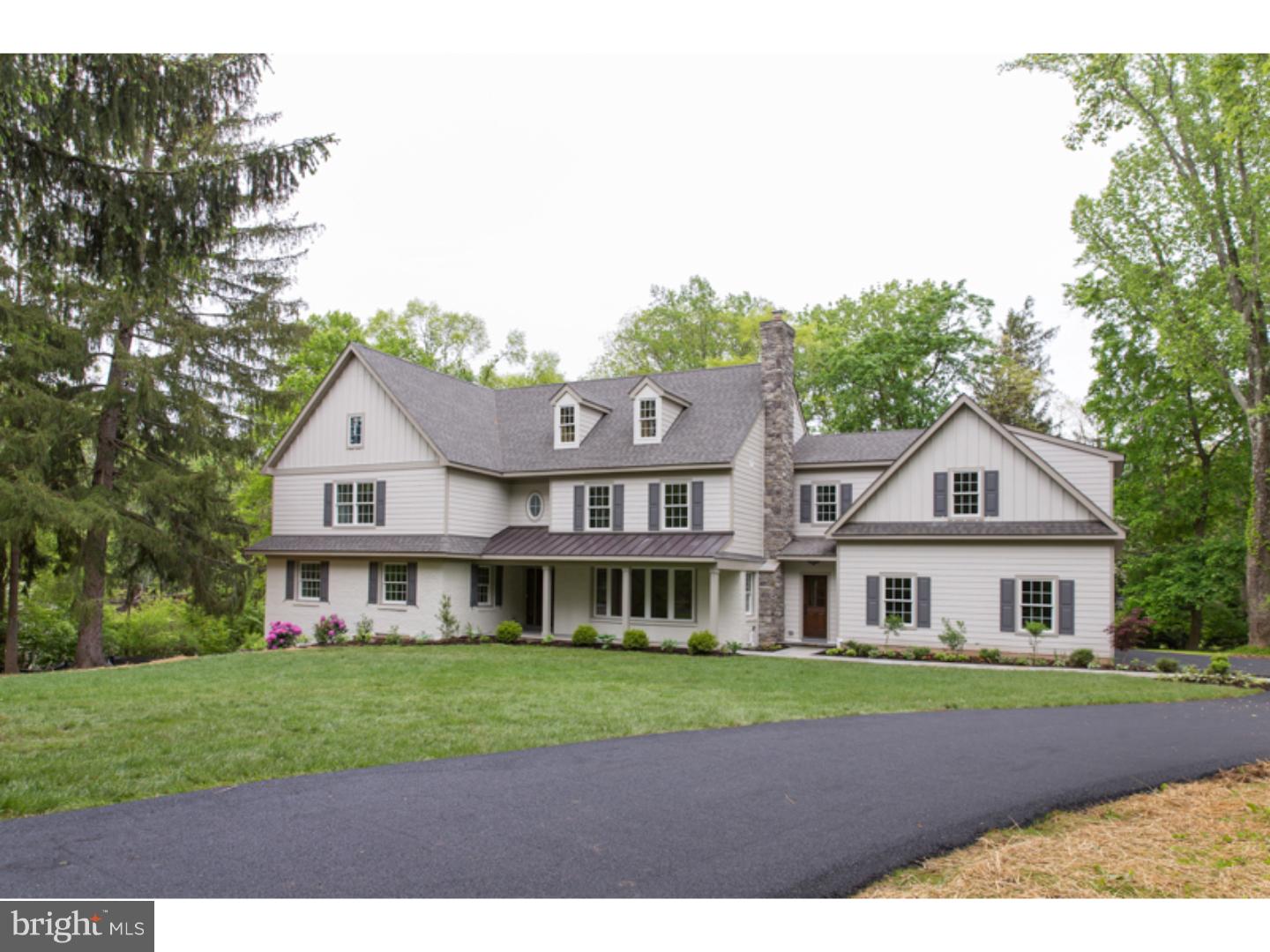 Welcome to 518 Millbrook Road. Fall in love with the exquisite architecture, professionally designed interior and its ideal location on a quiet cul-de-sac in the heart of Devon. With over 6,000 square feet throughout the first and second floors and over 1,200 finished lower level square feet, this beautiful custom renovation is sure to satisfy all lifestyles. 518 Millbrook Road provides an airy and elegant atmosphere with its open floor plan, tall ceilings and abundance of natural light. Gorgeous hardwood flooring, designer lighting fixtures and custom molding can be found in this stunning home. Begin your stay by entering through the spacious foyer just off of the front porch. To the right you will find an elegant living room with bay windows & gas fireplace that overlooks the front yard. Continue to find a guest suite perfect for overnight and long term stays. The study features a dual entryway with access from the foyer and the breakfast area. Step down into the great room that is surrounded by a scenic property view and features a coffered ceiling and gas fireplace. The eat-in kitchen is designed to fulfill all your entertaining needs and is equipped with Thermador appliances such as the 48" all gas slide in range, refrigerator/freezer towers with custom cabinet panels and a microwave drawer. Also enjoy the Uline under counter beverage center and Bosch fully integrated dishwasher. With the formal dining room adjacent to the kitchen and with a sliding door to the back patio, entertaining is made simple. The second level opens to the main hall where there is access to the master suite, three secondary bedrooms and a huge bonus room. Find relaxation in the expansive master suite which features a gas fireplace, make-up vanity area, custom walk-in closet and a large master bath with a freestanding soaking tub. The second bedroom includes a private bath, and bedrooms three and four both have access to the Jack & Jill bath. With a separate powder room and additional storage, the bonus room is perfect for a recreational room or play space. Convenience is found with the second level laundry room located just outside of the bedrooms. In addition to its unique amenities, this home boasts a three car garage with adjacent mudroom, a walk-out finished basement and a private rear reserve with a slate patio to suit your outdoor entertaining desires. Schedule a tour to experience the ultimate lifestyle that 518 Millbrook Road will provide you for years to come.