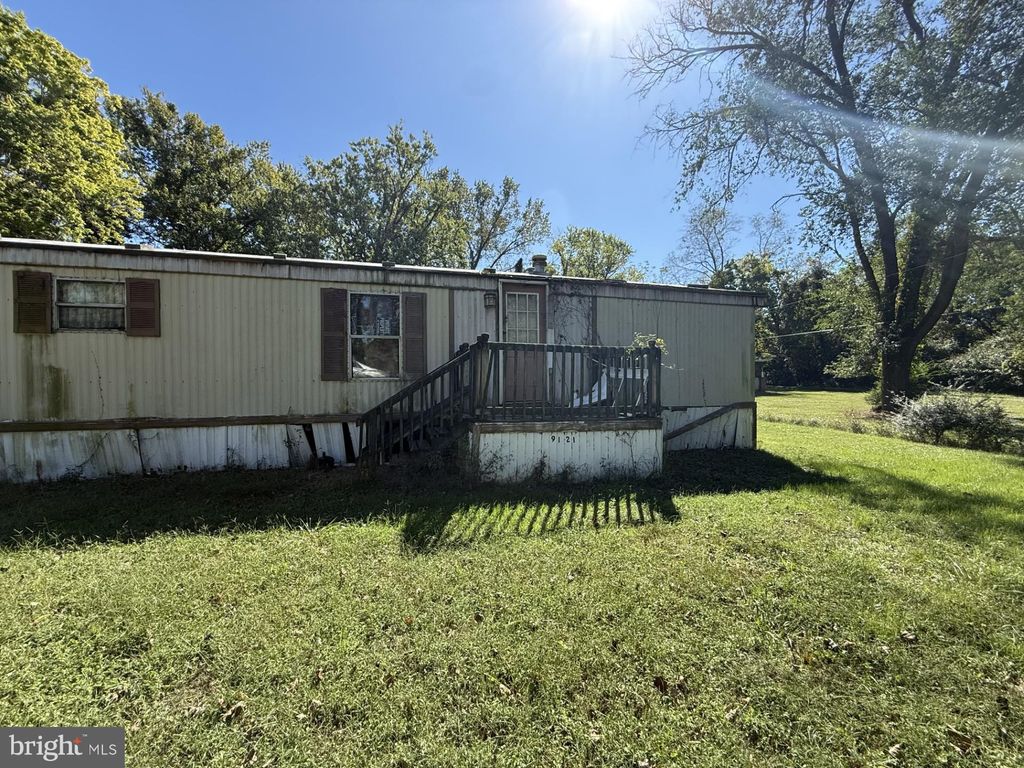 Photo of 9121 Deal Island Road, DEAL ISLAND, MD 21821 (MLS # MDSO2006472)