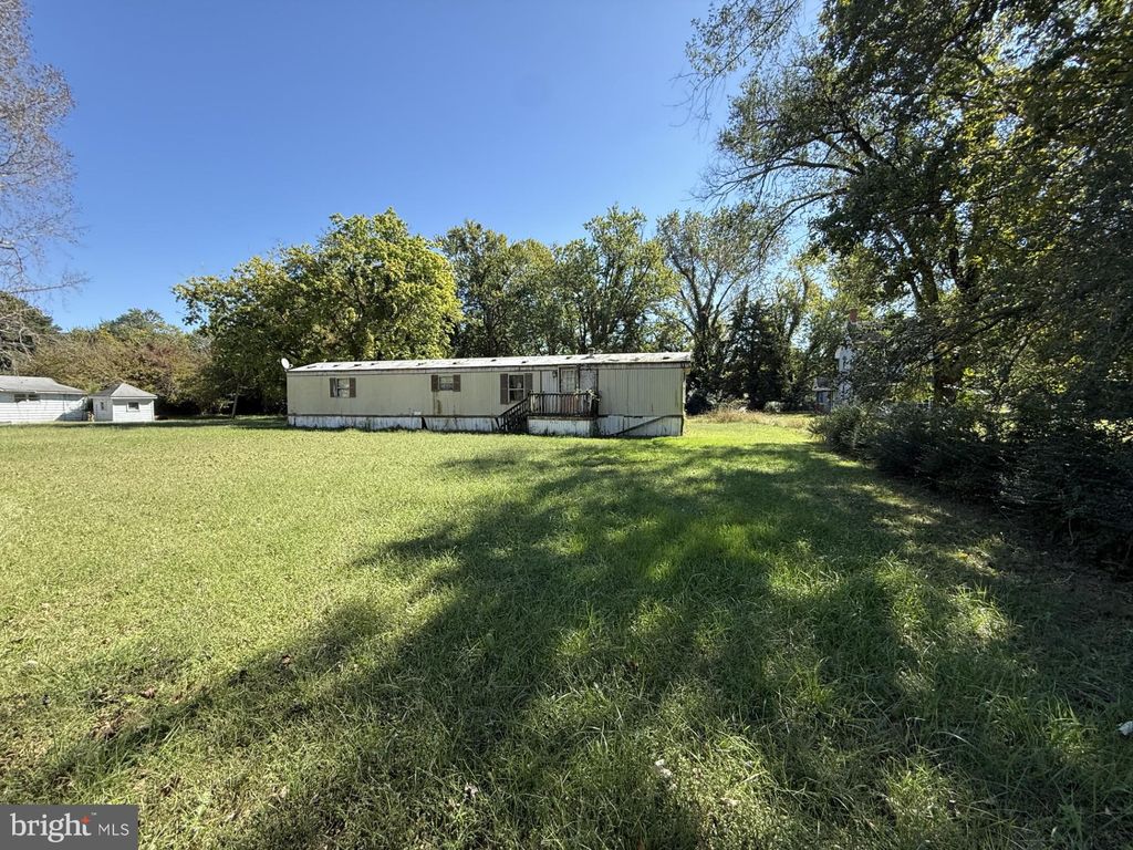 Photo of 9121 Deal Island Road, DEAL ISLAND, MD 21821 (MLS # MDSO2006472)