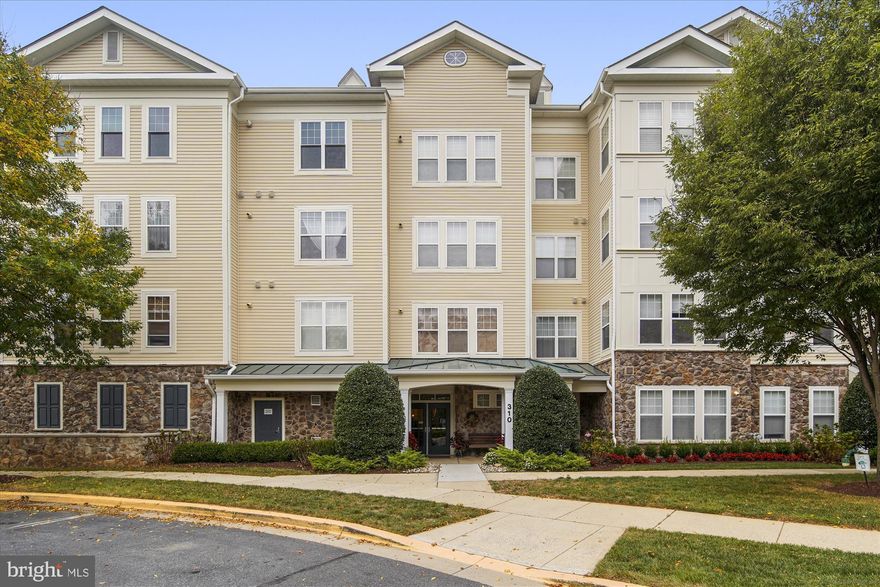 Welcome to this absolutely stunning and rarely available 2 bedroom, 2 bath upper level corner unit, offering 1,782 sq. ft. of luxurious living space in a peaceful, wooded setting.  Tucked away in one of the most private and quiet locations, this home offers both elegance and tranquility with every thoughtful detail.  Step into the spacious, light filled layout where the large Living and Dining areas flow seamlessly into a Sunroom surrounded by windows--an ideal spot for a home office, reading nook or simply relaxing and enjoying nature. Gleaming hardwood floors, a cozy gas fireplace, and abundant natural light create a warm inviting atmosphere perfect for everyday living and entertaining.  The fully updated kitchen is a chef's delight, featuring granite  countertops, stainless steel appliances, and ample cabinetry for all your storage needs.  Whether you are preparing a casual meal,  hosting dinner, the area combines space and functionality effortlessly. Retreat to the beautiful Primary Bedroom, a true haven with 2 extra large closets complete with custom closet systems and a fully renovated bath. Enjoy mosaic tile flooring, a glass enclosed shower, a double vanity with updated lighting and decor'  that elevates the entire space.  The second bedroom also offers a large closet with custom closet systems while the second full bath has  been tastefully updated with a tub/shower combination and tile flooring.  There is a full sized washer/dryer located  in the condo and an attached garage.  This home  offers access to the community pool, clubhouse, exercise room and is close to shopping, dining and entertainment options.  With a spacious dining area, charming living room, updated finishes throughout and unmatched views of surrounding woods, this home offers a rare blend of space, style, and serenity. Don't miss your chance to own this exceptional unit. It's a true gem.  Some photos have been virtually staged.