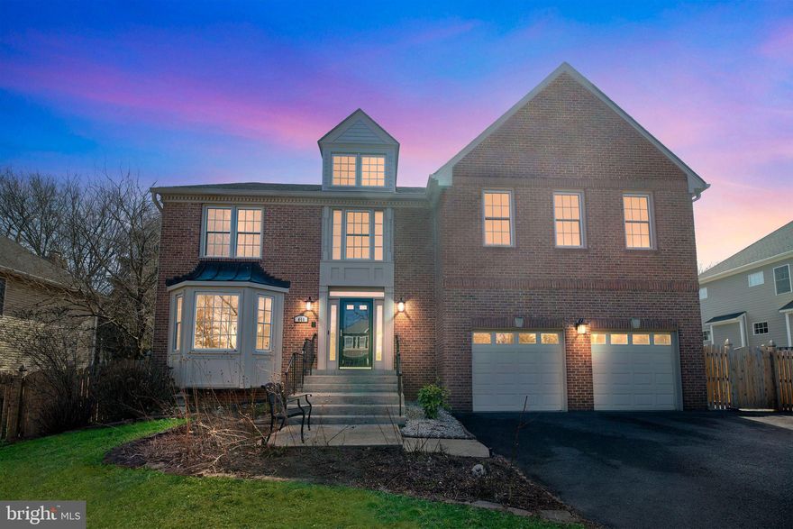 Welcome to this elegant 3-story Colonial home in the heart of Vienna offering 4 bedrooms, 4 full bathrooms, and 1 half bathroom. Nestled in a serene, tree-lined neighborhood, this elegant brick-front residence boasts timeless charm and modern upgrades.

Step inside to gleaming hardwood floors throughout the main level, where you'll find a formal living and dining room, a cozy family room with a gas fireplace, and a private library/study—ideal for working from home. The gourmet kitchen features an island cooktop, ample cabinetry, and plenty of counter space, perfect for entertaining.

Upstairs, the luxurious primary bedroom offers a spacious sitting area, a deluxe en-suite bath with a soaking tub, and dual vanities. The additional three bedrooms are carpeted for comfort, providing generous space for family and guests.

The fully finished lower level boasts a large recreation room, a full bathroom, and flexible space for additional rooms or storage. The basement is equipped with two sump pumps for added peace of mind. Outside, enjoy the expansive deck and fenced backyard, ideal for outdoor gatherings and relaxation. Anderson French doors enhance the home's elegance and provide seamless access to outdoor spaces.

Additional features include a 2-car attached garage with a 220V outlet, perfect for electric vehicle charging or workshop needs, and a prime location with easy access to shopping, dining, and top-rated schools. Don't miss this opportunity to own a beautiful home in a sought-after community!

Schedule your private tour today!