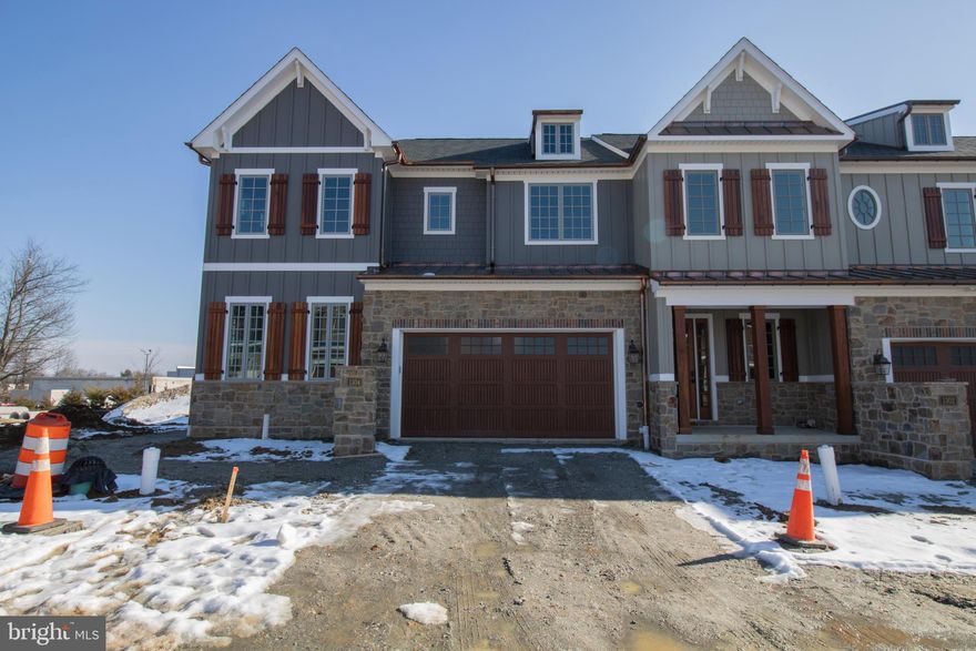 This beautiful end unit townhome is under construction and will be ready for late 2025 delivery. Spacious owner's bedroom located on the first floor. The covered deck adds a great exterior experience. exquisite countertops, wood handmade dovetail cabinets, 36" cooktop with double oven and many other finishes complete the gourmet kitchen. This home also features an elevator rough-in, unfinished basement, 10' 1st floor ceilings and many other beautiful touches. Don't wait ! -Home is under construction, Photos are of similar home. Contact sales reps for details. Welcome Home to Active Adult Living at it finest in Columbia Place. The new construction homes feature first level master suite, beautiful green landscaping, exterior details with grand curb appeal. All of this convenient to the best attractions and entertainment in Delaware. The Homeowner Association maintains the common areas of this small exclusive community. Columbia Place features future 24-hour gated access, completed clubhouse with fitness center, walking trails, outdoor common areas and more. Location is just a few hundred feet from Brandywine Creek State Park. Call Sales Center to view.