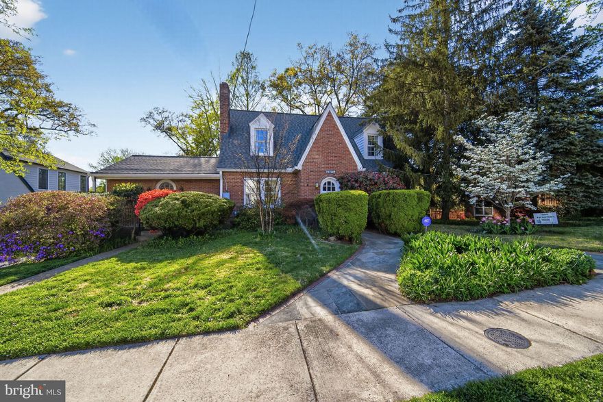 Absolute Charmer in Cherrydale!!  Come check out this 5 BR / 3 bath gorgeous home, on a huge 15,000+ square foot property, with mature landscaping, and greenery everywhere.  This 1936 Tudor home has all the character and charm you could hope for, with all the modern conveniences of daily life.  The layout and flow of the house provide utter convenience, with the bedrooms and bathrooms distributed nicely across three levels of living.  The kitchen has had a modern renovation, with ample pantry space, and yet it still maintains all the charm of this historic home.  Beautiful chestnut woodwork consistently runs throughout the main floor to reinforce the beauty of its time period.  The showpiece of the house is the 33-foot long porch (with natural wood ceiling and floor!), a private oasis, which overlooks the mature landscaping, including a majestic oak,  two  Dawn redwoods, a ginko, a magnolia, dogwood, maple, holly,  pine and azaleas in the large yard.  There are stairs leading to a stone patio, and in the corner of the property, there's a Zen garden with a beautiful carved stone Buddha.  Back inside the home, there  is  a formal living room, with a fireplace (two working fireplaces in the house!), which gives way to a generous sunroom.  Upstairs you’ll find a lovely sitting area which leads to both upstairs bedrooms.  Built-ins and other detail work really capture the essence of this Tudor masterpiece.  A finished basement, with ample storage, and a two-car garage, with additional adjacent carport provide more space and ease of living.  All this with all the charm, character, and convenience of the highly sought-after Cherrydale community.  Just two blocks from Washington-Liberty High School, Oak Park and the W&OD bike trail.   This is a must see!