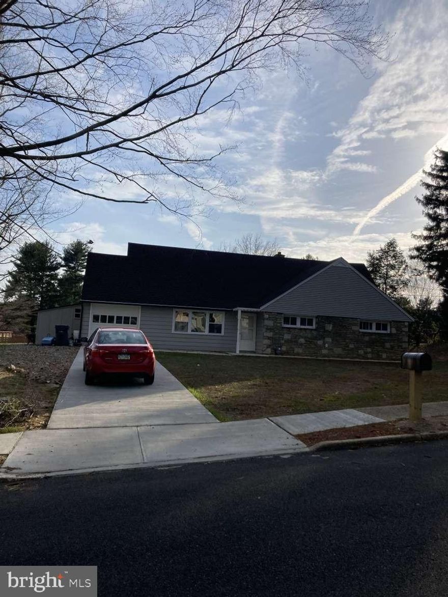 Discover this fully renovated 2,450 sq ft, 5-bedroom gem, blending timeless charm with modern luxury. Step into a stunning new kitchen featuring quartz countertops, a spacious island, GE appliances (electric range, vented hood, refrigerator), and custom white cabinetry. The home boasts two updated full bathrooms, gleaming hardwood floors upstairs, and durable vinyl on the main level. Recent upgrades include new HVAC, roof, windows, plumbing fixtures, water heater, interior sewer line, a 200Amp CB panel with 85% new wiring, recessed lighting throughout, and a fresh concrete driveway. Move-in ready and perfectly located near parks, schools, and shopping, this beauty won’t last long!