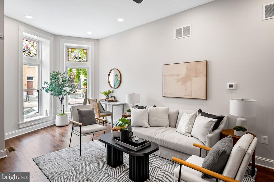 Modern design meets historic charm in the heart of Barclay. This three-bedroom, two-and-a-half bath CHAP Tax Credit renovation is solar-ready and includes a deck, garden, and off-street parking. Significant property tax savings thanks to the pending 10-year CHAP historic tax credit. While priced at $395,000 the significant property tax savings thanks to the pending CHAP historic tax credits will make your payments feel like you are buying a home in the $330,000 range.  Home is eligible for Baltimore City's Vacant to Value $10,000 booster grant. Property approved for the Healthy Neighborhood Special Purchase Program, providing an interest rate 1% below market rates. 

Welcome to your urban oasis in the vibrant Barclay neighborhood, where thoughtful design, quality craftsmanship, and city convenience converge. Designed by Trace Architects and built by Edgemont Builders, this home delivers clean, modern lines with timeless functionality. 432 East 22nd is fully electric and built solar-ready, designed with indoor air quality and long-term energy savings in mind, offering not only peace of mind but future-forward sustainability. Step inside to an open-concept kitchen/living area perfect for everyday living and effortless entertaining. A separate dining room offers flexible space ideal as a formal dining room, cozy den, or creative studio. A generous fully fenced garden is the perfect spot for pets and people and is suitable for outdoor dinners, container gardening, or simply unwinding. A private parking pad accommodates one to two cars for ultimate city convenience. Upstairs, the second level features two spacious bedrooms, each with large walk-in closets, a beautifully finished hall bath, and a dedicated laundry room (washer-dryer hookups in place). The entire third floor is a serene primary suite retreat with high ceilings, generous light, and a calming atmosphere that invites relaxation. All upper levels feature abundant natural light and modern finishes, and the unfinished basement offers great storage potential or a workroom space. This is more than just a renovation—it’s a reimagination of Baltimore rowhome living, blending contemporary comfort, architectural integrity, and smart sustainable living. Just blocks from Station North, Penn Station, and local restaurants, markets, and cultural hotspots.
