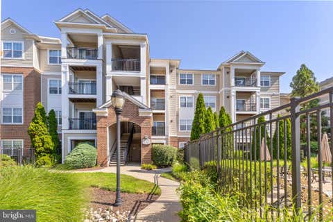 Photo of 12958 Centre Park Circle #118, HERNDON, VA 20171 (MLS # VAFX2326738)
