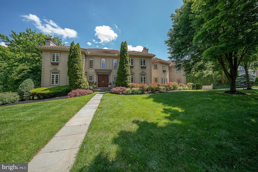 A gorgeous, gated home sitting on a level .69-acre lot on a quiet cul-de-sac in Villanova is not to be missed.  This 7,435 square foot home features 6 bedrooms, 6 full bathrooms, 2 half baths, high-end amenities, and more.  As you enter the double front doors into the 2-story foyer, you will see the in-home office and formal dining room with a double-sided fireplace ready to host your next dinner party.  The beautiful gourmet kitchen has top-of-line appliances, quartz countertops, an island, a pantry, and a breakfast area.  Arched doorways lead to a sunlit great room with a vaulted ceiling and French doors to the slate patio, perfect for entertaining.  Convenient mudroom with half bath, laundry, and access to the 3-car garage.   Head up the open curved staircase to find the primary bedroom suite with a fireplace, 2 walk-in closets, and a full ensuite primary bathroom, including a frameless shower, Jacuzzi tub, makeup counter, and a double vanity.  Four additional bedrooms with four full ensuite baths, including one with its own sitting room, complete this level.  The finished lower level offers even more living space with its recreation room, home gym, a 6th bedroom, and another full bathroom.  Convenient home generator.  Step outside to the lush grounds, with a lovely back patio, inground heated pool, and private access to the 42-acre natural gardens, formerly the Haas Estate.  Located in the Award Winning Lower Merion School District.  Easy access to major roadways, 476, 76, and many shops and restaurants.