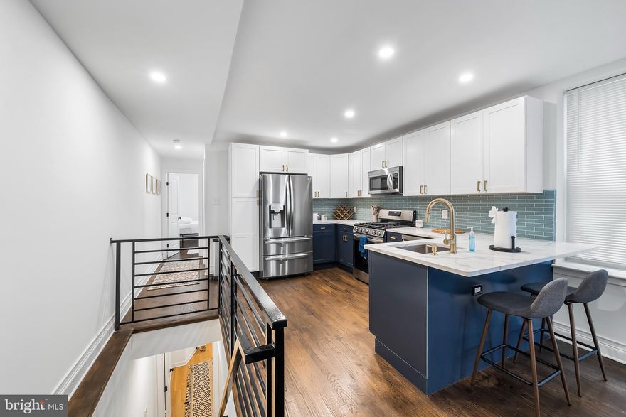 Pack your bags and step into this beautifully renovated bi-level condo offering 3 spacious bedrooms and 2 full bathrooms. Just minutes from Center City and Rittenhouse Square, this home places you in the heart of one of Philadelphia’s most sought-after neighborhoods.

The main level features a sunlit open layout with a sleek modern kitchen, complete with white and navy cabinetry, granite countertops, and stainless steel appliances. Enjoy hardwood floors throughout and a stylishly tiled full bathroom, along with a generously sized bedroom perfect for guests or a home office.

Downstairs, you'll find two additional bedrooms, another full bath with tub and shower, a dedicated laundry area, and bonus storage space—offering comfort, functionality, and flexibility.

Don’t miss the shared rooftop deck with panoramic views of the Philadelphia skyline—an ideal space for relaxing or entertaining.

Located just steps from the Philadelphia Museum of Art, Kelly Drive, Fairmount Park, and cultural landmarks like The Barnes, The Rodin, and The Franklin Institute. Fairmount Ave's vibrant dining scene is right outside your door, with local favorites including Zorba’s, Bar Hygge, Fare, Jack’s Firehouse, OCF Coffee, and more.